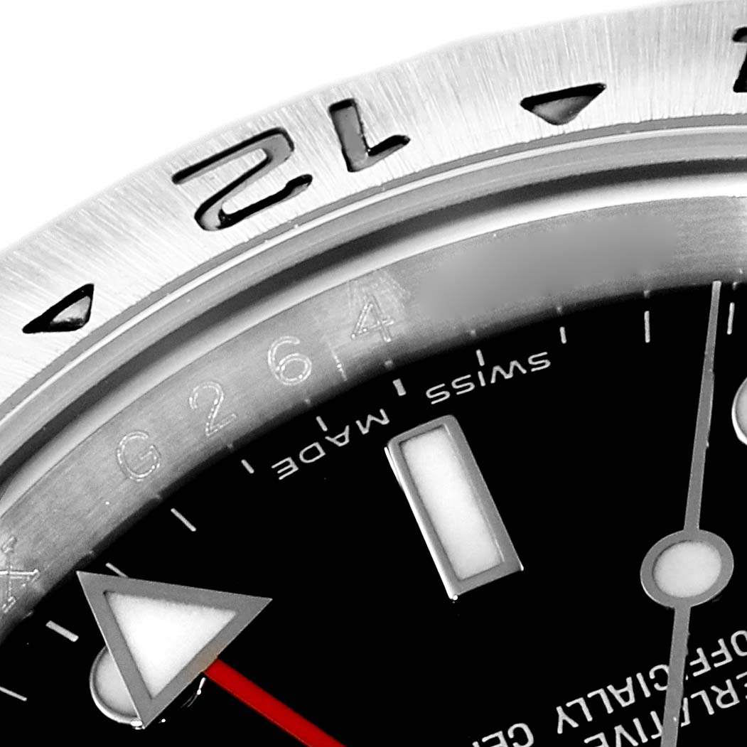 This is a close-up of the dial and bezel of the Rolex Explorer 16570 Men's Stainless Steel Black Dial 16570 Men's Stainless Steel Black Dial watch, showing the minute hand, hour markings, and part of the bezel.