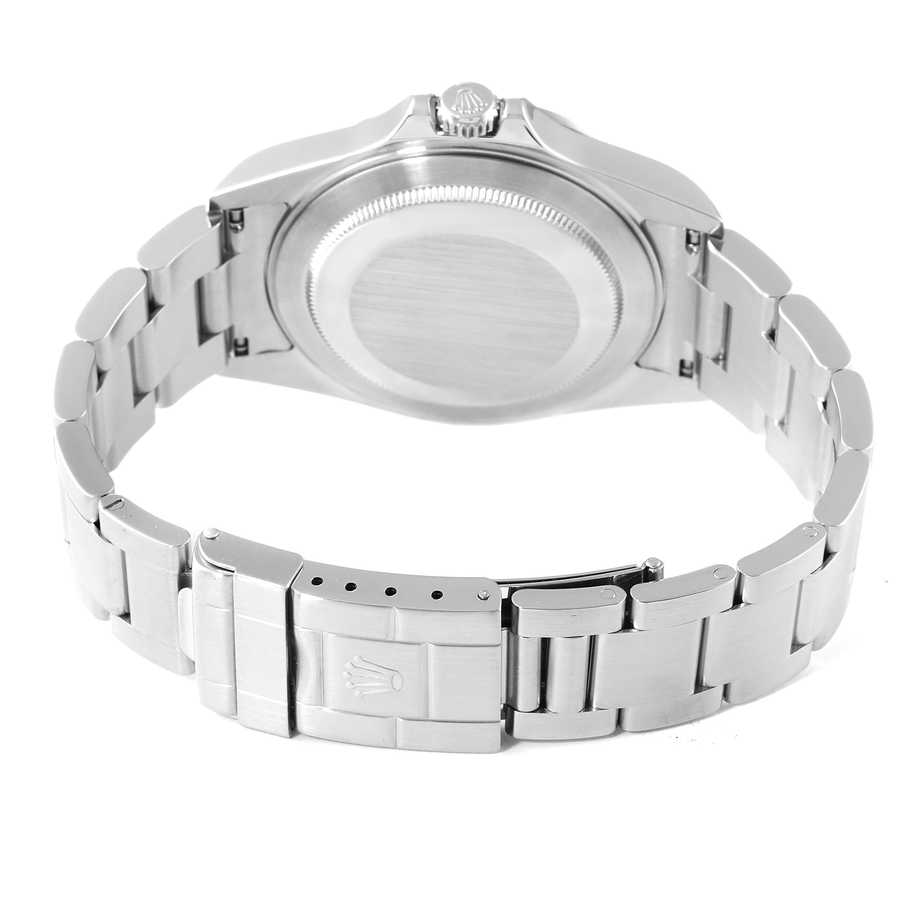 The image shows the back view of a Rolex Explorer 16570 Men's Stainless Steel Black Dial 16570 Men's Stainless Steel Black Dial watch, focusing on the case back, bracelet, and clasp with the Rolex logo.