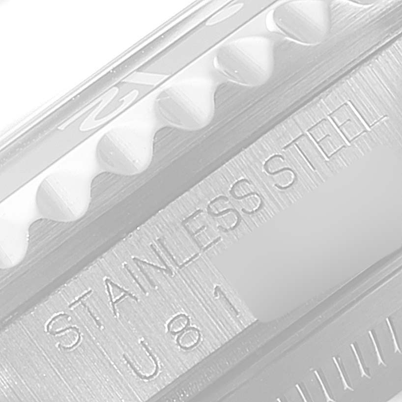 The close-up angle shows the "STAINLESS STEEL" engraving and part of the bezel on the Rolex GMT-Master 16700 Men's Stainless Steel Black Dial 16700 Men's Stainless Steel Black Dial watch.