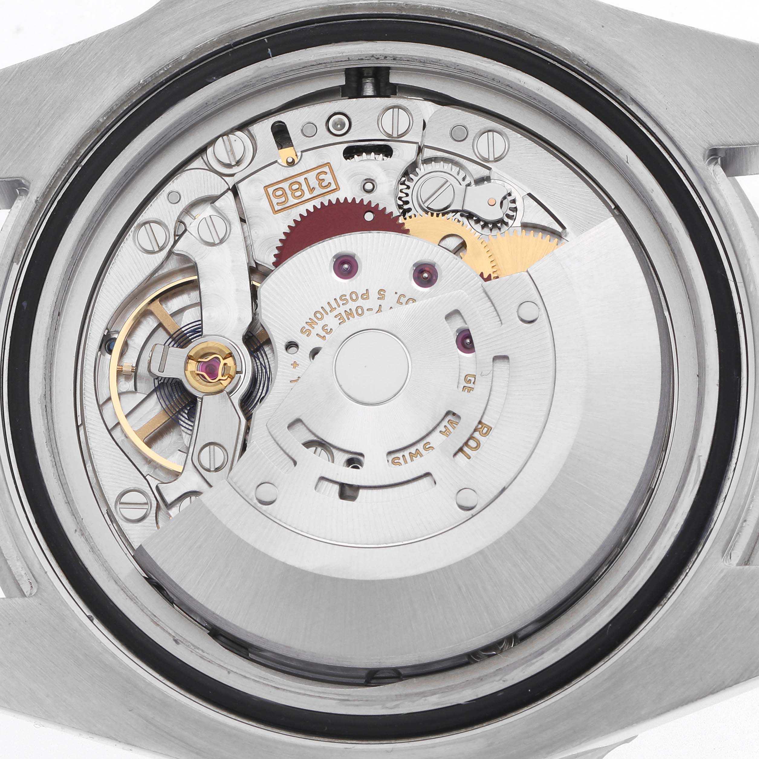 The image shows the movement of a Rolex GMT-Master 116710BLNR Men
s Stainless Steel Black Dial 116710BLNR Men
s Stainless Steel Black Dial watch from the back, displaying gears and components.