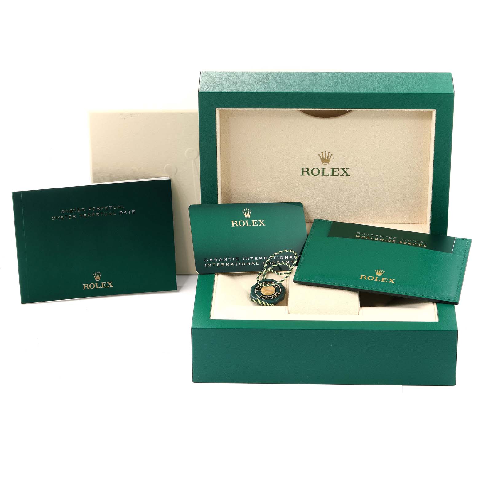 The image shows an open Rolex Mid-Size 277200 Women
s Stainless Steel Silver Dial 277200 Women
s Stainless Steel Silver Dial watch box with accompanying manuals, guarantee card, and tag from a front angle.