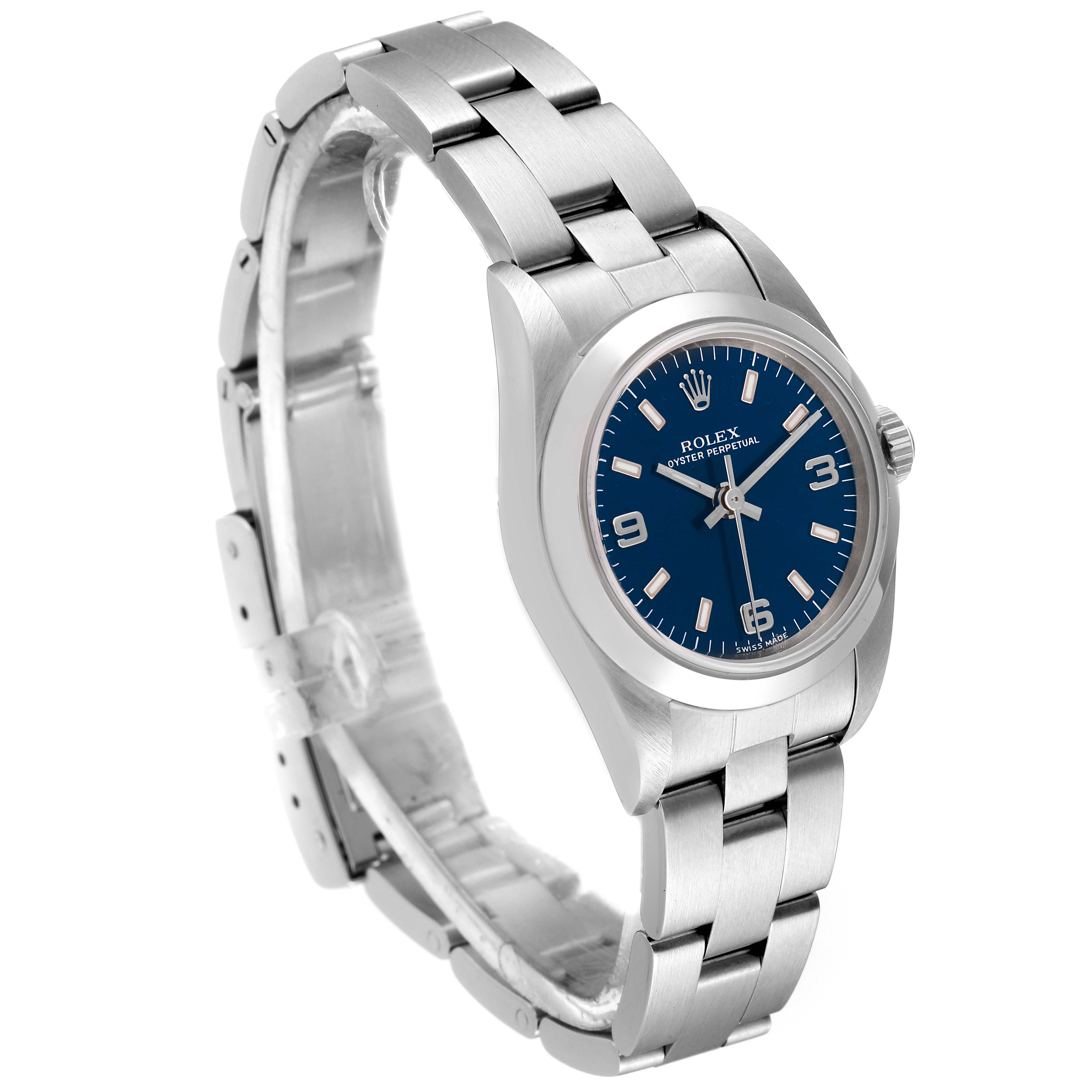 The Rolex Oyster Perpetual 76080 Women
s Stainless Steel Blue Dial 76080 Women
s Stainless Steel Blue Dial watch is shown at an angle highlighting its blue dial, bezel, and stainless steel bracelet.