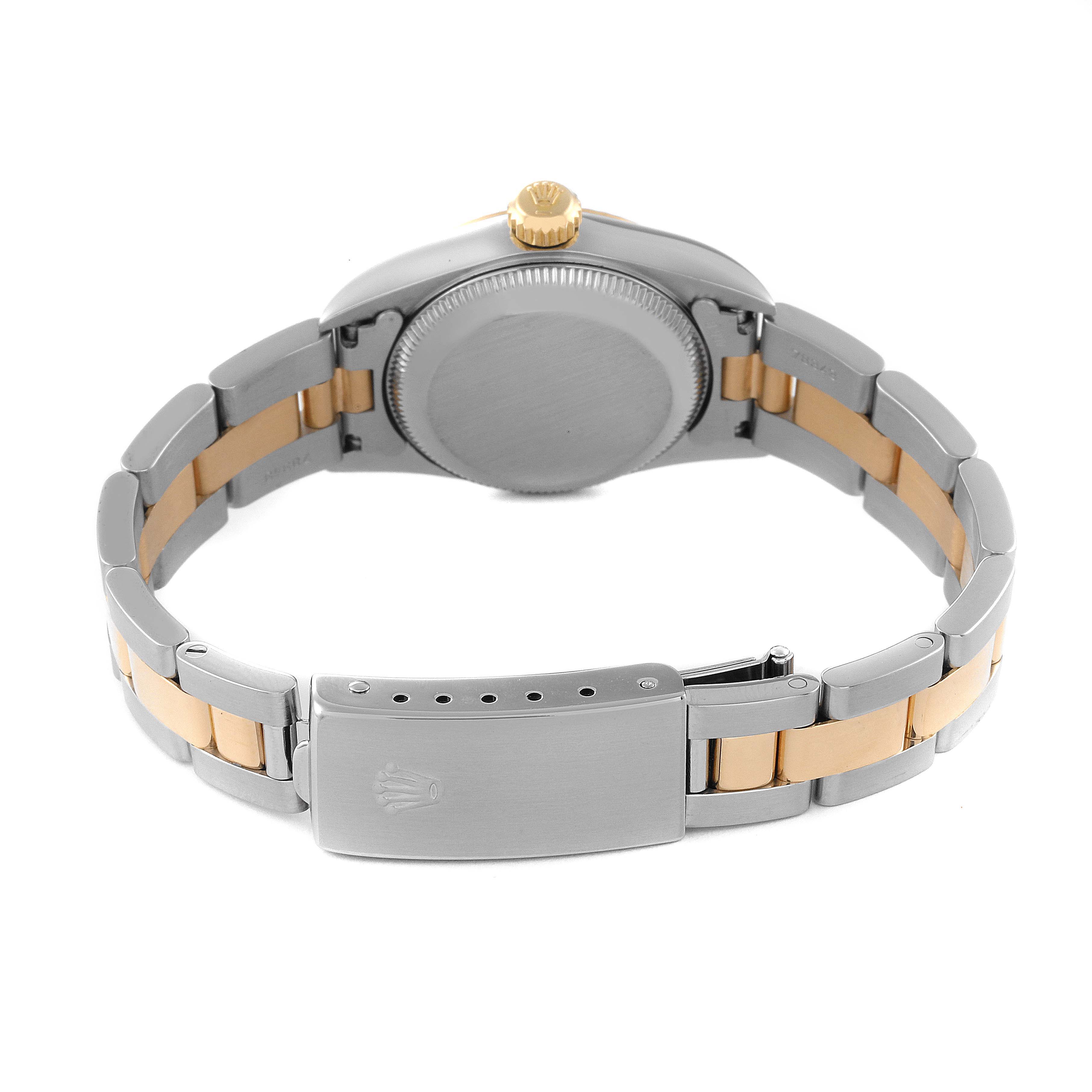 This image shows the back and bracelet of a Rolex Oyster Perpetual 67193 Women
s Steel and Gold (two tone) Black Dial 67193 Women
s Steel and Gold (two tone) Black Dial watch in bi-metal configuration.