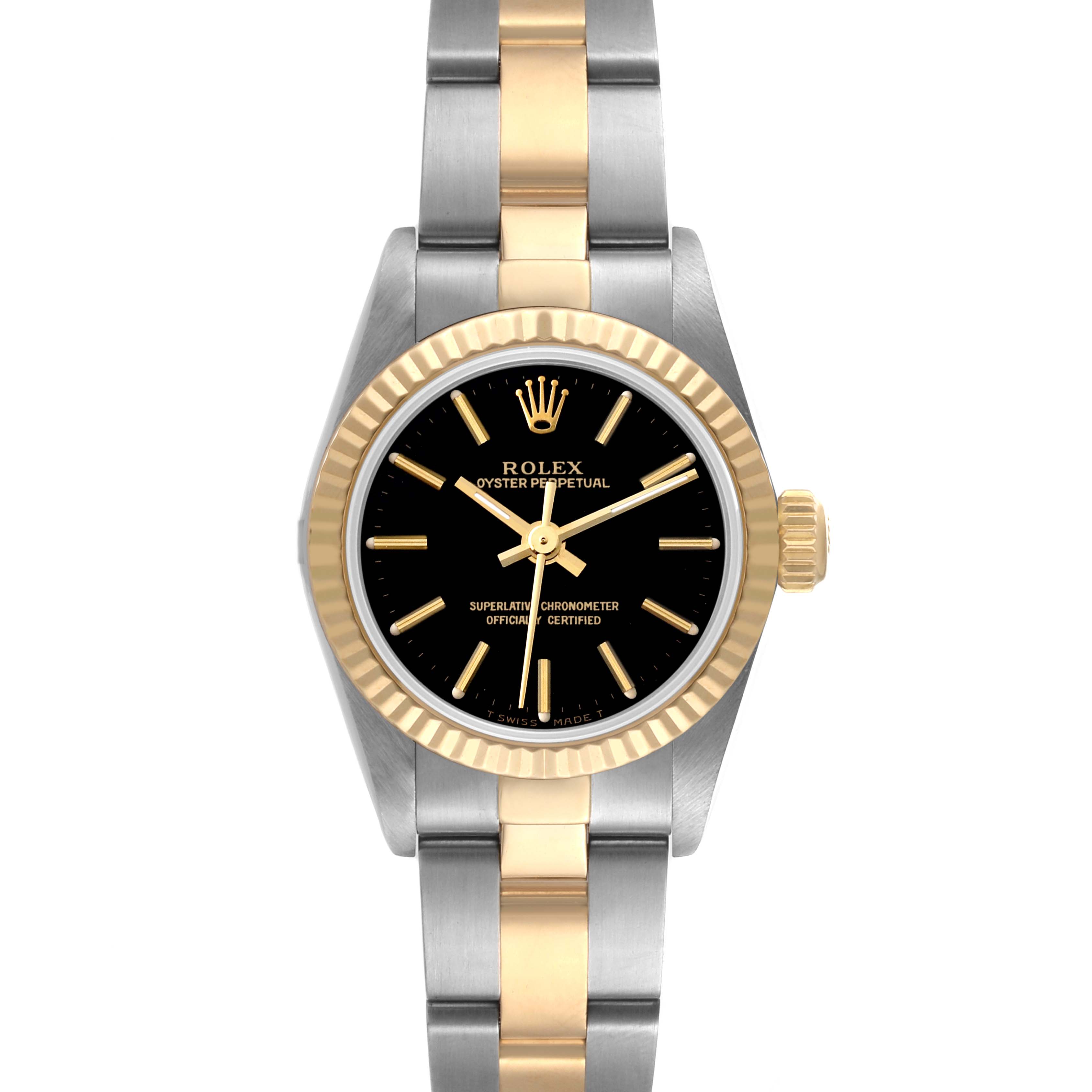 This image shows a Rolex Oyster Perpetual 67193 Women
s Steel and Gold (two tone) Black Dial 67193 Women
s Steel and Gold (two tone) Black Dial watch from a front view, highlighting its black dial, gold markers, and two-tone band.