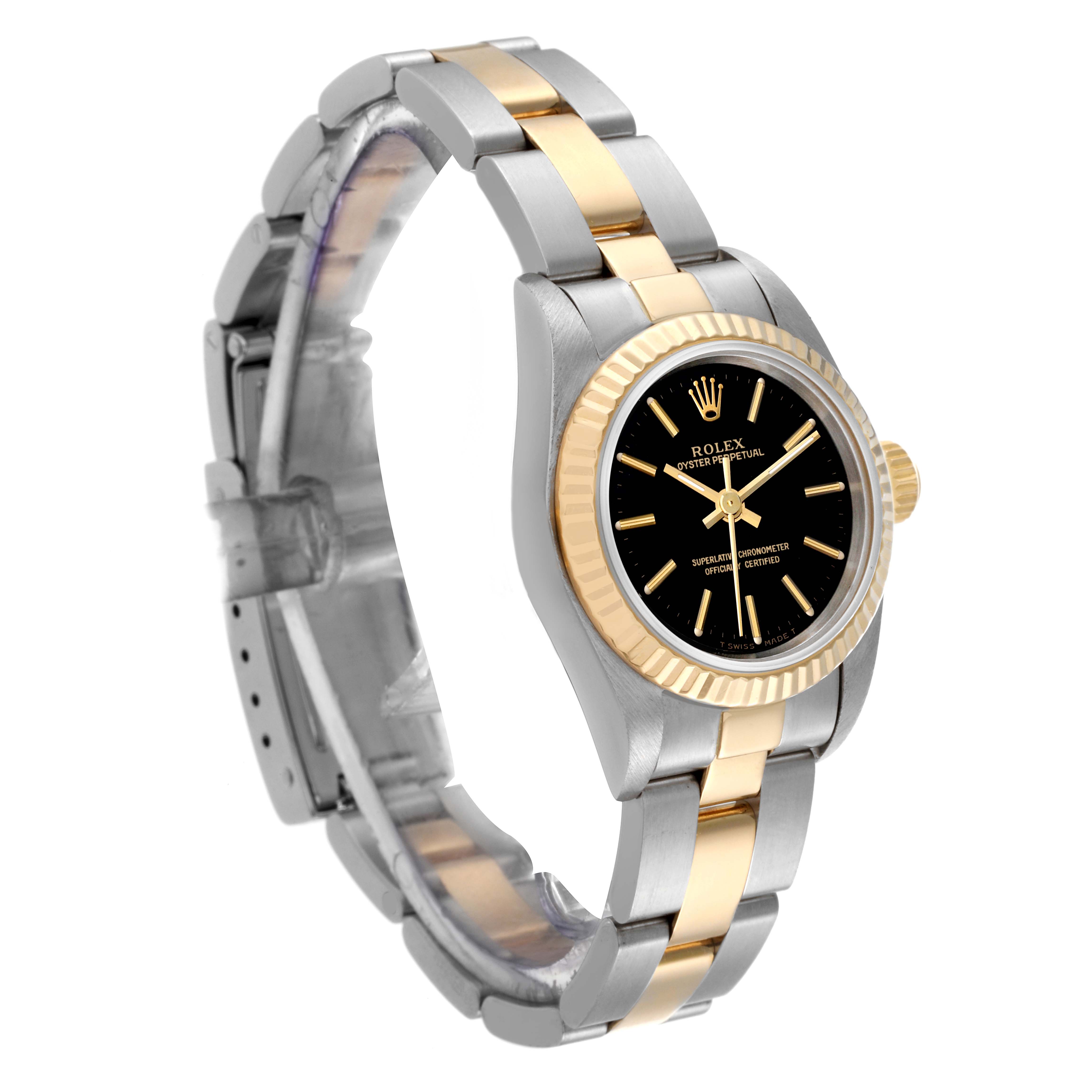 This image shows a Rolex Oyster Perpetual 67193 Women
s Steel and Gold (two tone) Black Dial 67193 Women
s Steel and Gold (two tone) Black Dial watch at a slight side angle, highlighting the bracelet, bezel, and black dial.