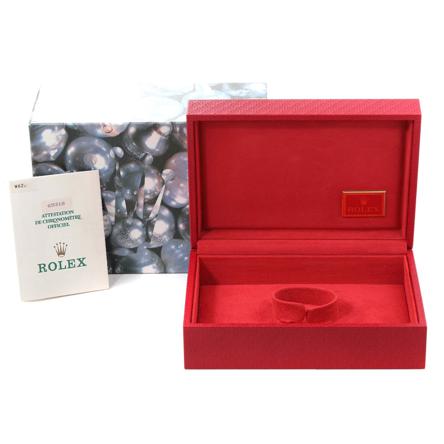 The image shows an empty red Rolex Pearlmaster 69318 Women
s Yellow Gold Mother of Pearl Dial 69318 Women
s Yellow Gold Mother of Pearl Dial watch box, its outer box, and a certification booklet.