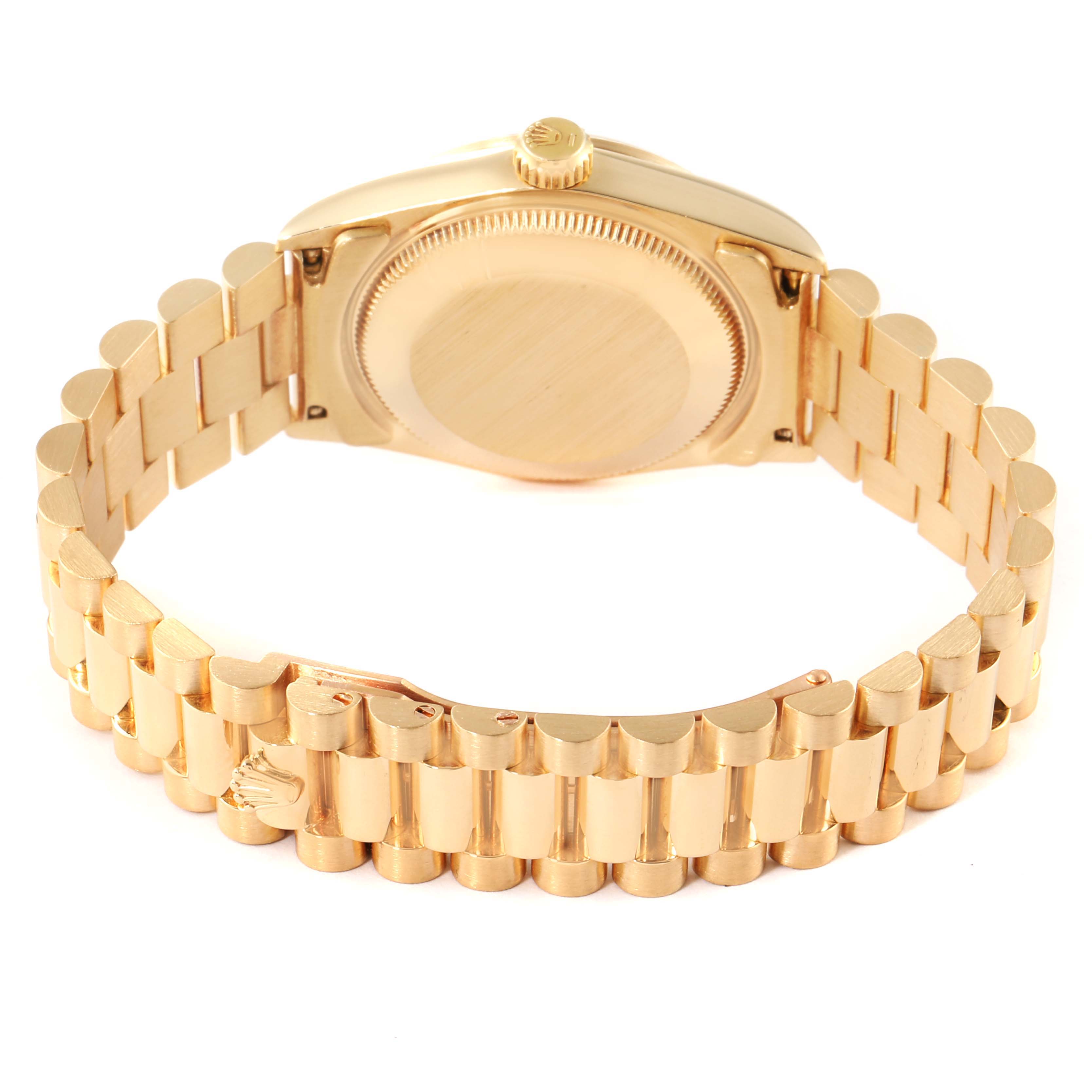 The image shows the back of the Rolex President 68278 Women
s Yellow Gold Champagne Dial 68278 Women
s Yellow Gold Champagne Dial model watch, focusing on the case back and bracelet.