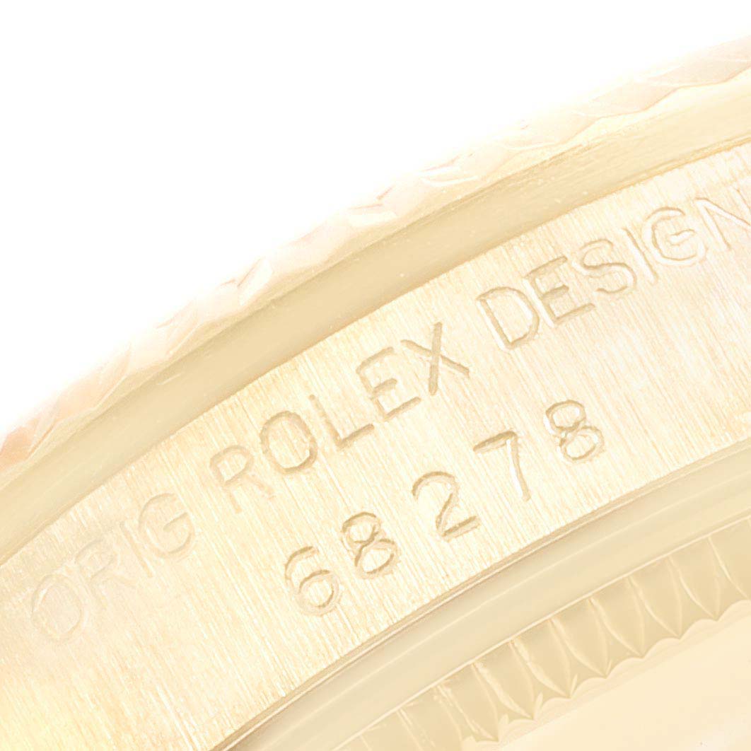 Close-up of the model number engraved on the side of the Rolex President 68278 Women
s Yellow Gold Champagne Dial 68278 Women
s Yellow Gold Champagne Dial watch bezel.