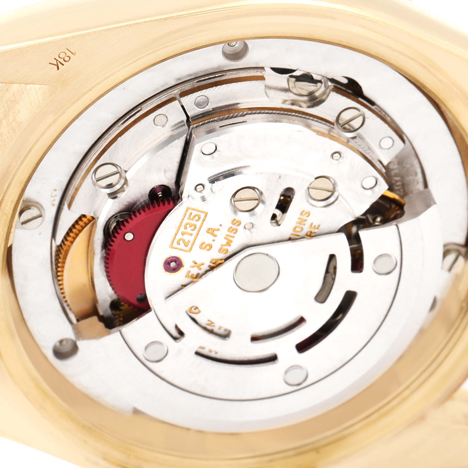 This image shows a close-up view of the movement mechanism inside a Rolex President 68278 Women
s Yellow Gold Champagne Dial 68278 Women
s Yellow Gold Champagne Dial model watch, highlighting the intricate components.