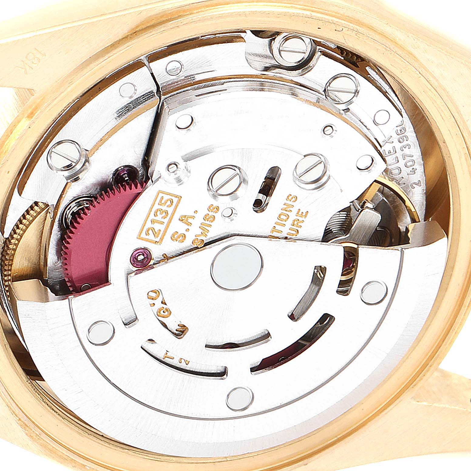 The image shows a close-up of the movement mechanism in a Rolex President 69178 Women
s Yellow Gold Champagne Dial 69178 Women
s Yellow Gold Champagne Dial model watch.