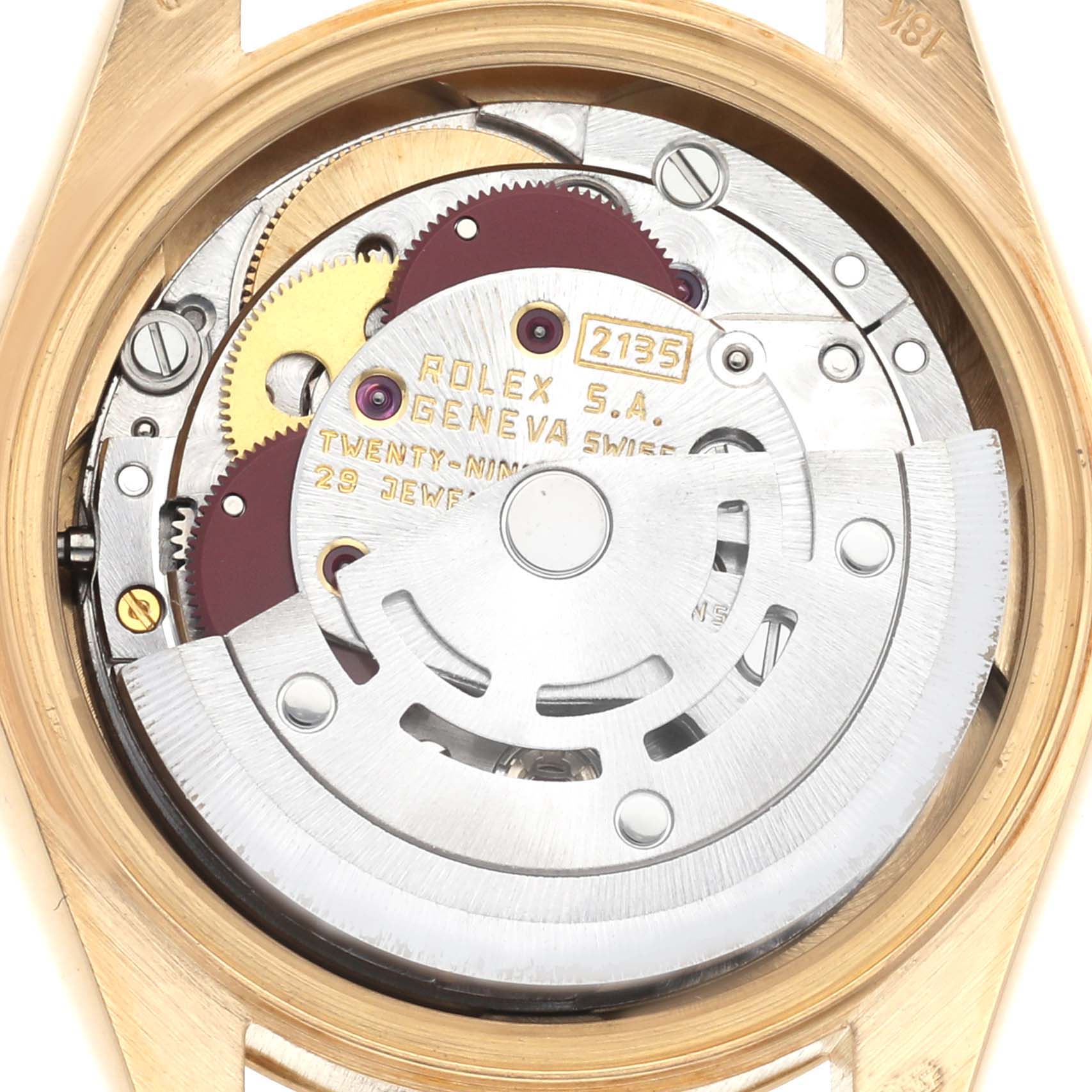 The image shows the inner movement of a Rolex President 69178 Women
s Yellow Gold Champagne Dial 69178 Women
s Yellow Gold Champagne Dial watch model from an overhead angle, highlighting the rotor and gears.