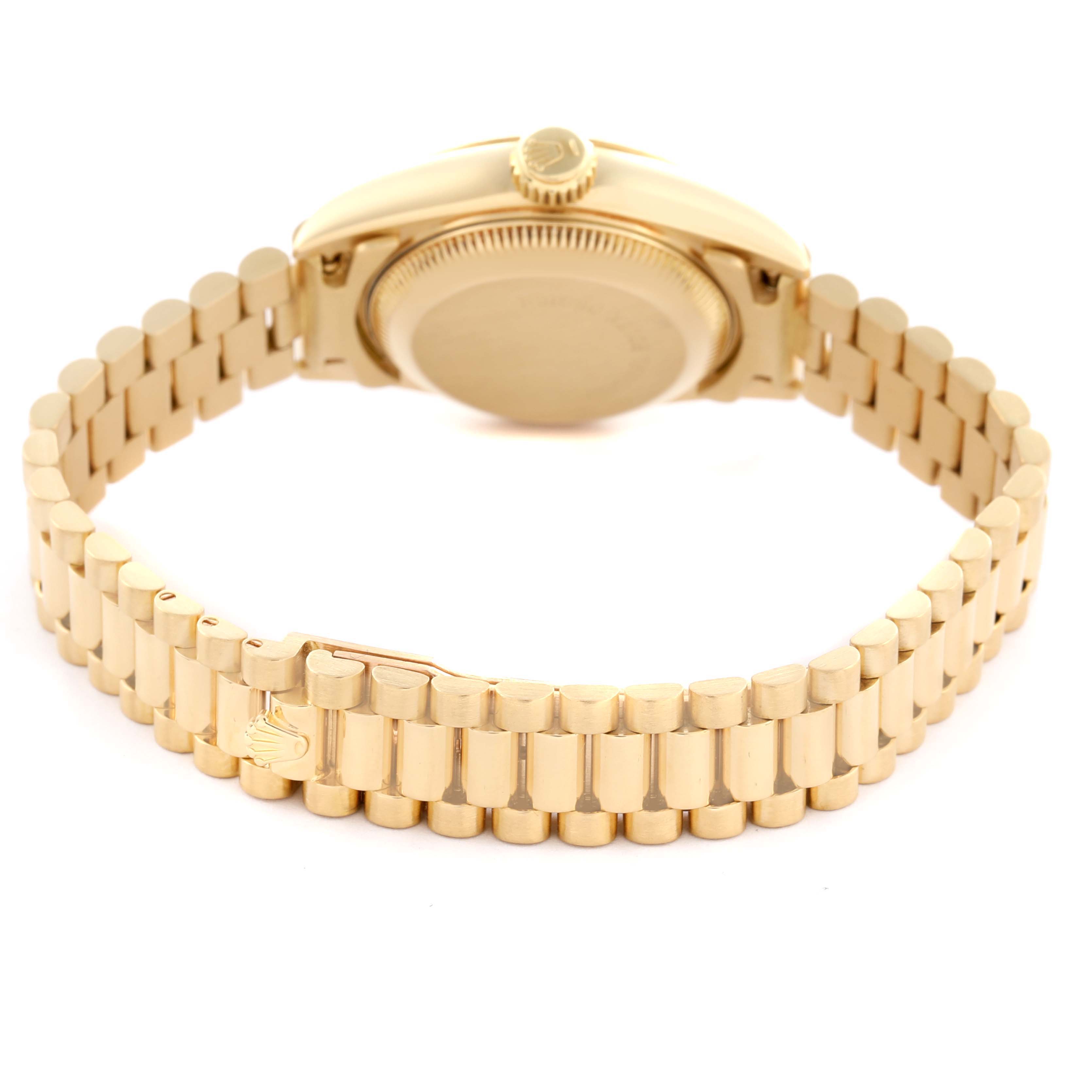 The image shows the President model by Rolex from a rear angle, highlighting the case back, side profile, and bracelet.