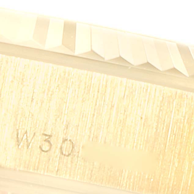 The image shows a close-up of the bezel and part of the bracelet of a Rolex President 69178 Women
s Yellow Gold Mother of Pearl Dial 69178 Women
s Yellow Gold Mother of Pearl Dial model watch.