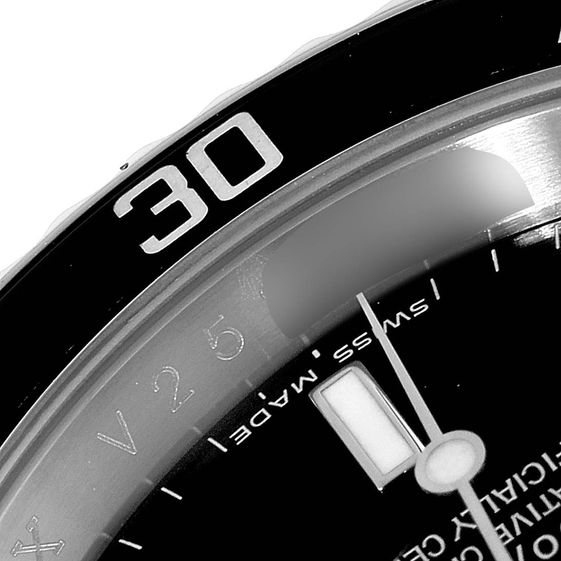 This image shows a close-up of the bezel and part of the dial of the Rolex Submariner 16610 Men's Stainless Steel Black Dial 16610 Men's Stainless Steel Black Dial watch.