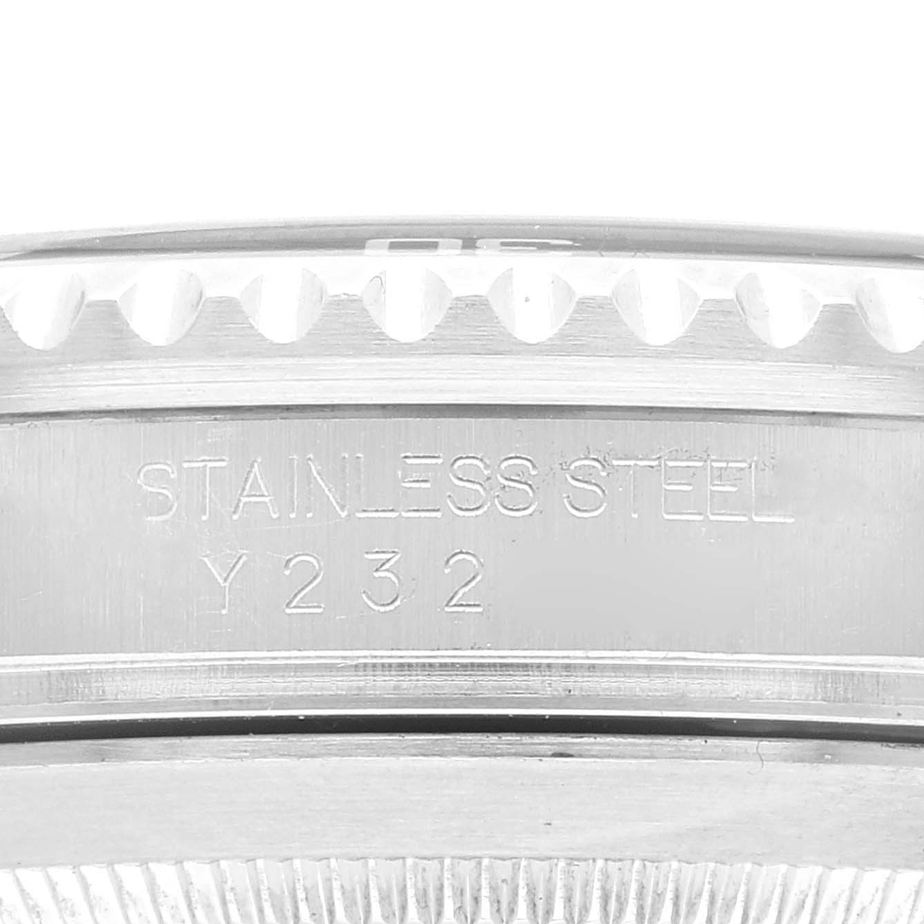 This image shows a close-up of the side of a Rolex Submariner 16610 Men
s Stainless Steel Black Dial 16610 Men
s Stainless Steel Black Dial watch, focusing on the stainless steel engraving.