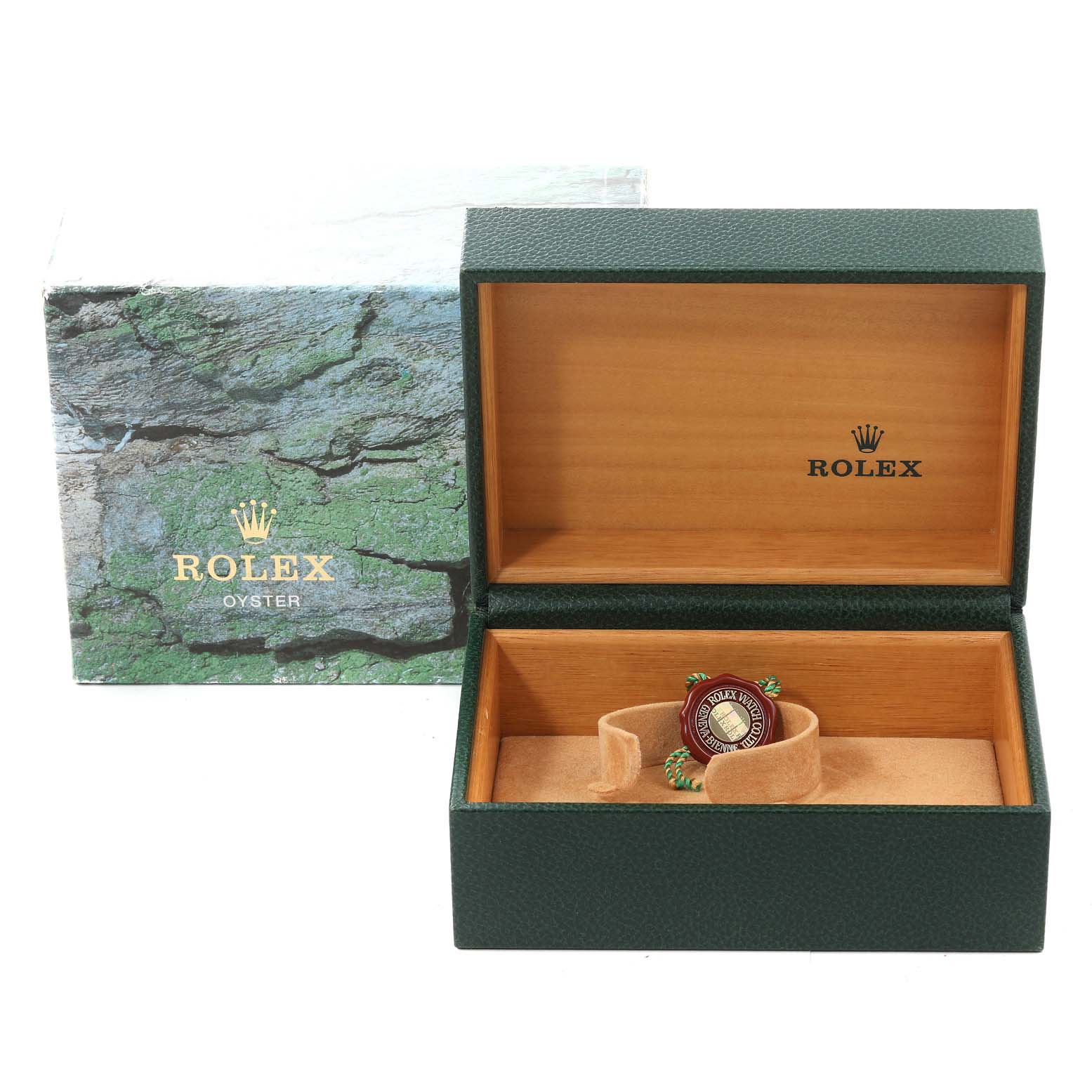 The image shows a Rolex Submariner 16610 Men
s Stainless Steel Black Dial 16610 Men
s Stainless Steel Black Dial watch box, open to reveal an empty cushion and a Rolex tag inside.