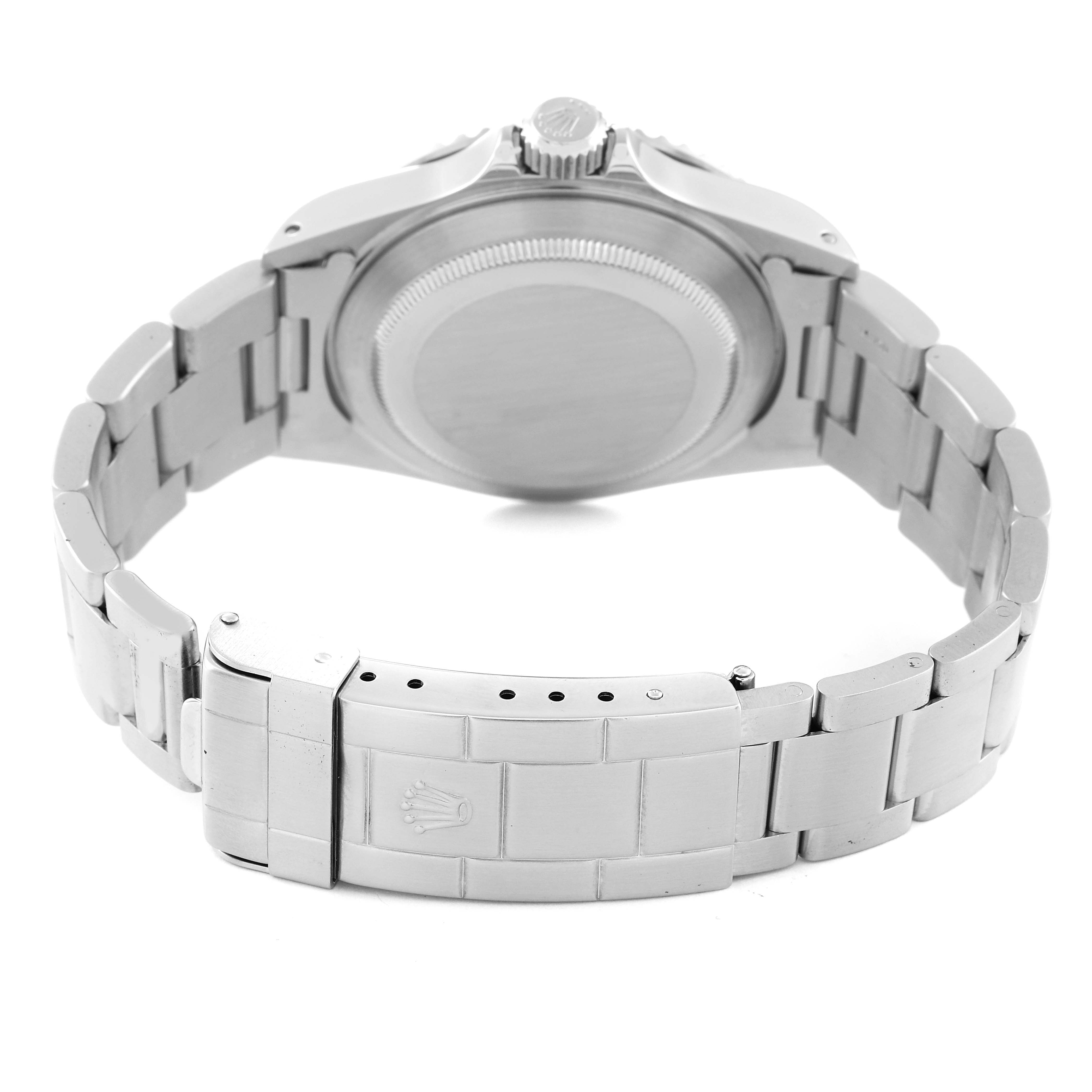 The image shows the back of a Rolex Submariner 14060M Men
s Stainless Steel Black Dial 14060M Men
s Stainless Steel Black Dial watch, highlighting the case back, bracelet, and clasp.