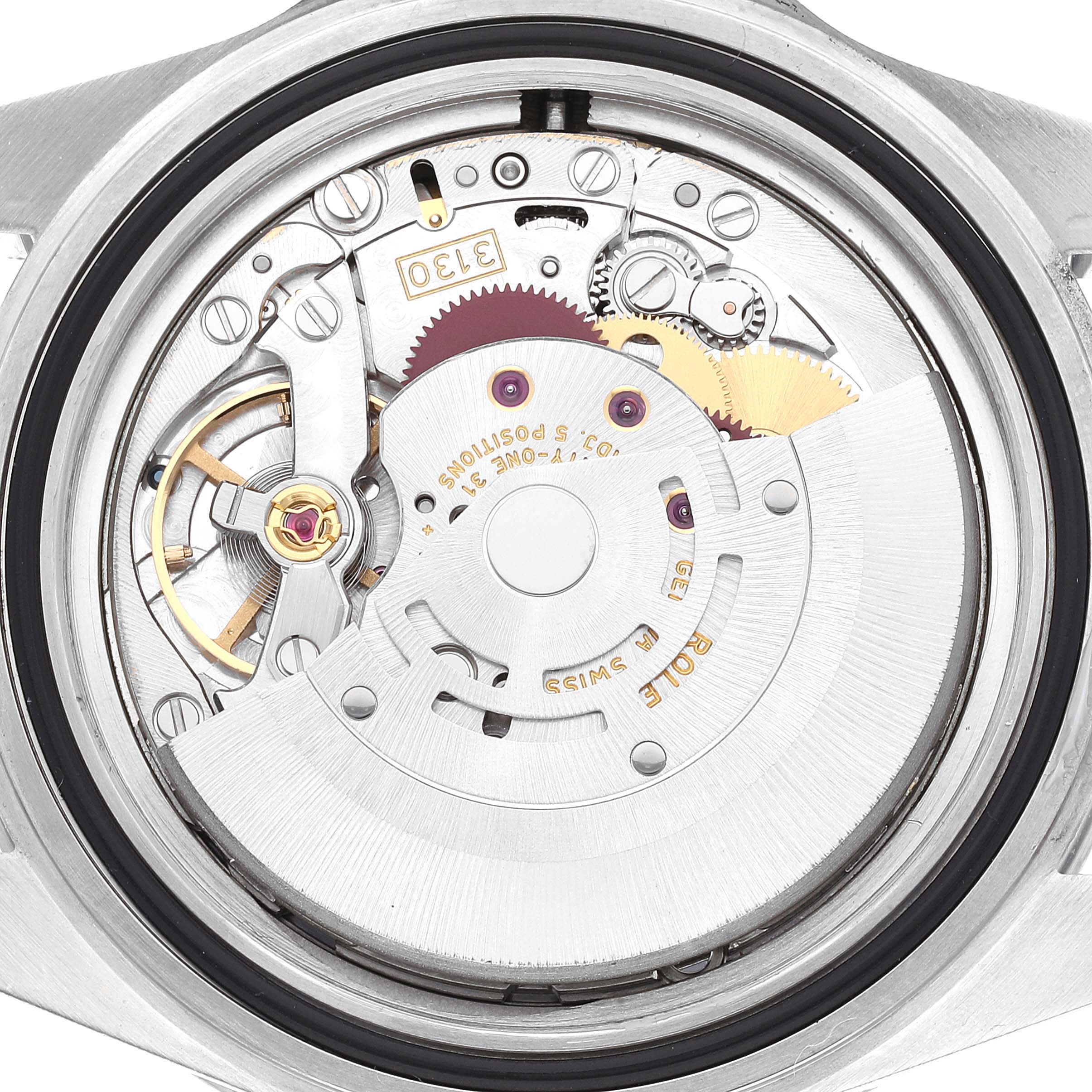 This is an image of the backside of a Rolex Submariner 14060M Men
s Stainless Steel Black Dial 14060M Men
s Stainless Steel Black Dial watch, revealing its intricate movement components.