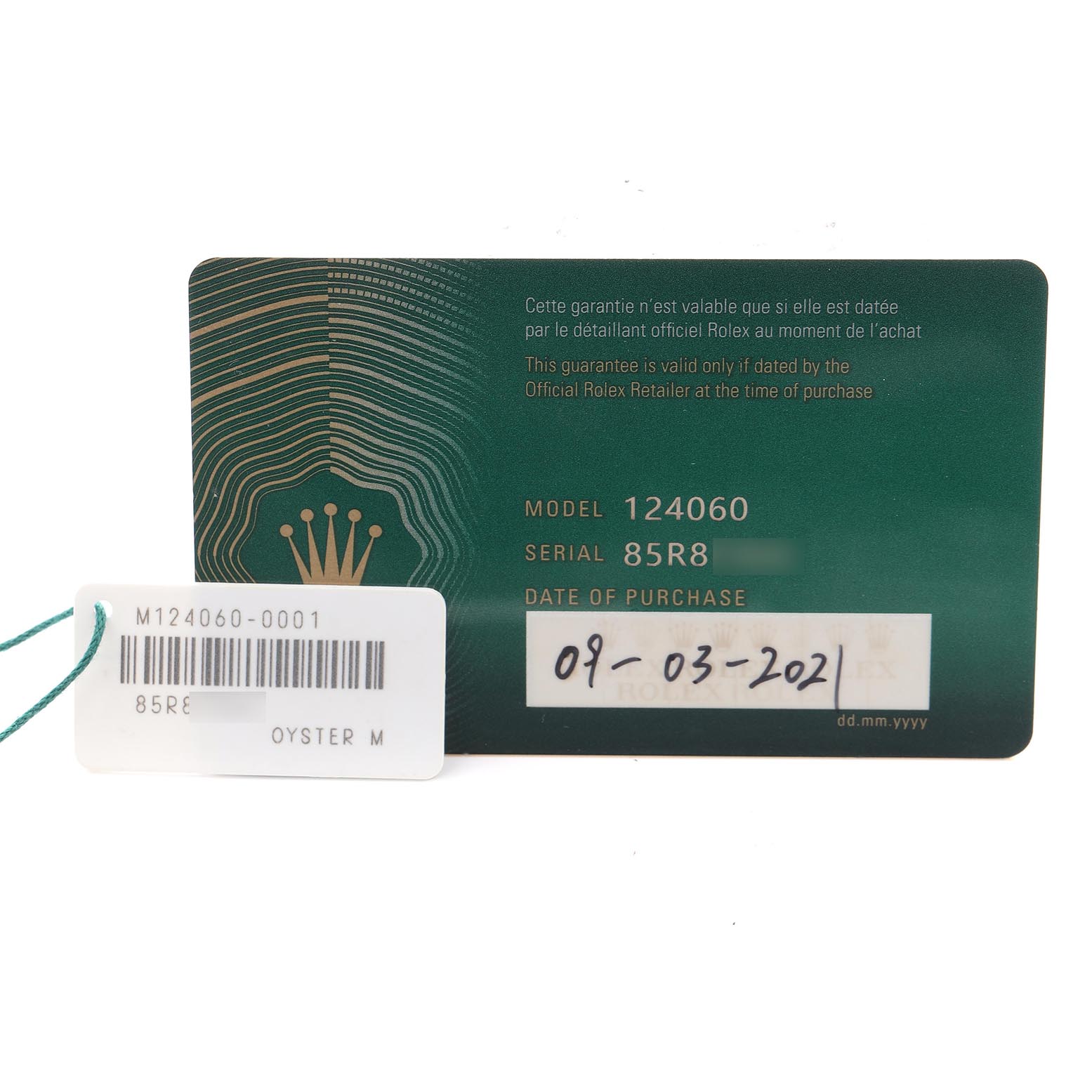 The image shows a Rolex Submariner 124060 Men
s Stainless Steel Black Dial 124060 Men
s Stainless Steel Black Dial model 124060 warranty card and tag, viewed from the front.