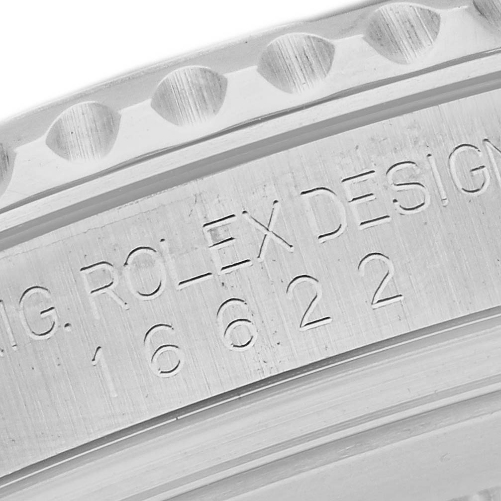 This image shows a close-up of the engravings on the side of the Rolex Yacht-Master 16622 Men's Stainless Steel Silver Dial 16622 Men's Stainless Steel Silver Dial watch bezel.