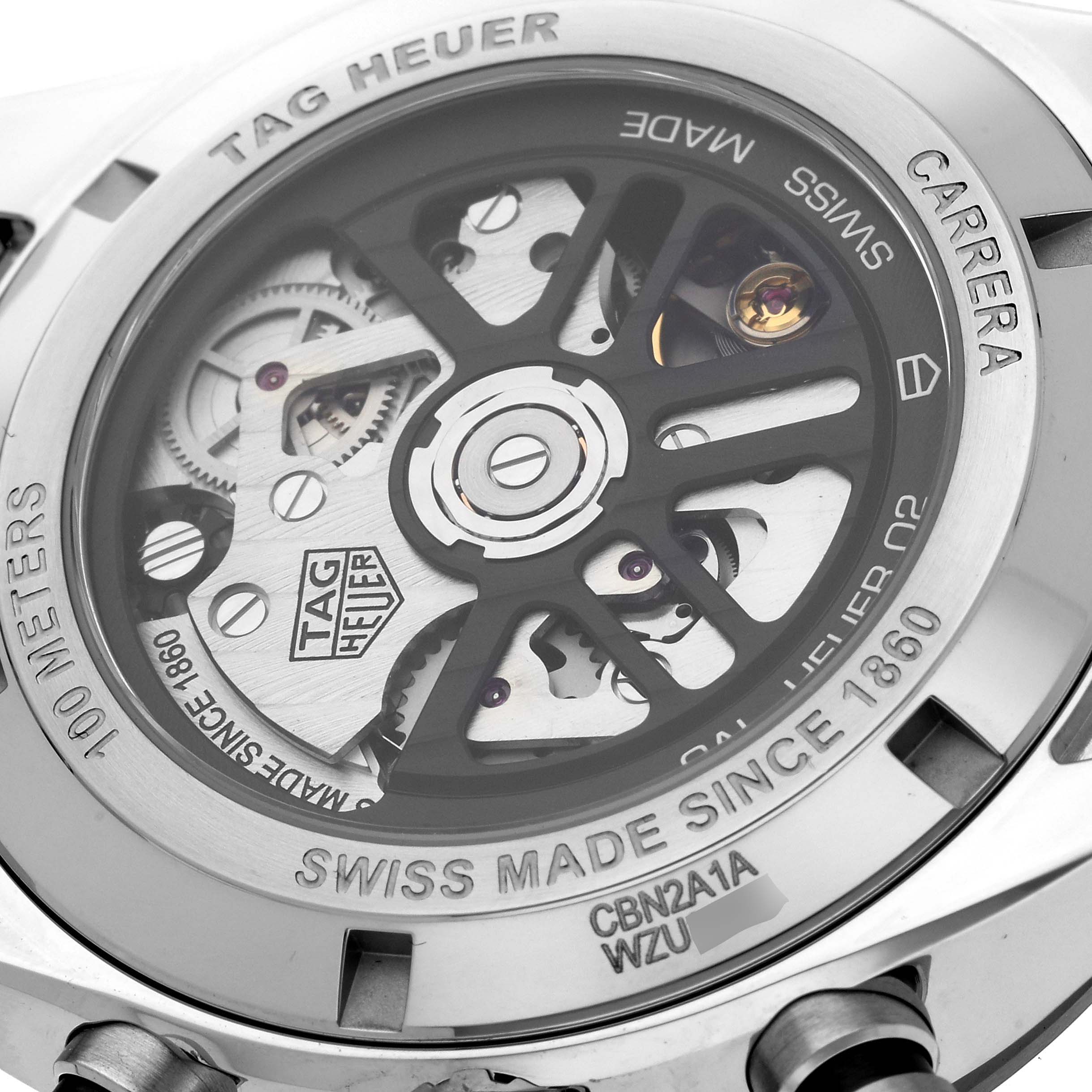 The image shows the back case of the Tag Heuer Carrera CBN2A1A Men's Stainless Steel Blue Dial CBN2A1A Men's Stainless Steel Blue Dial watch, revealing the inner mechanical components.