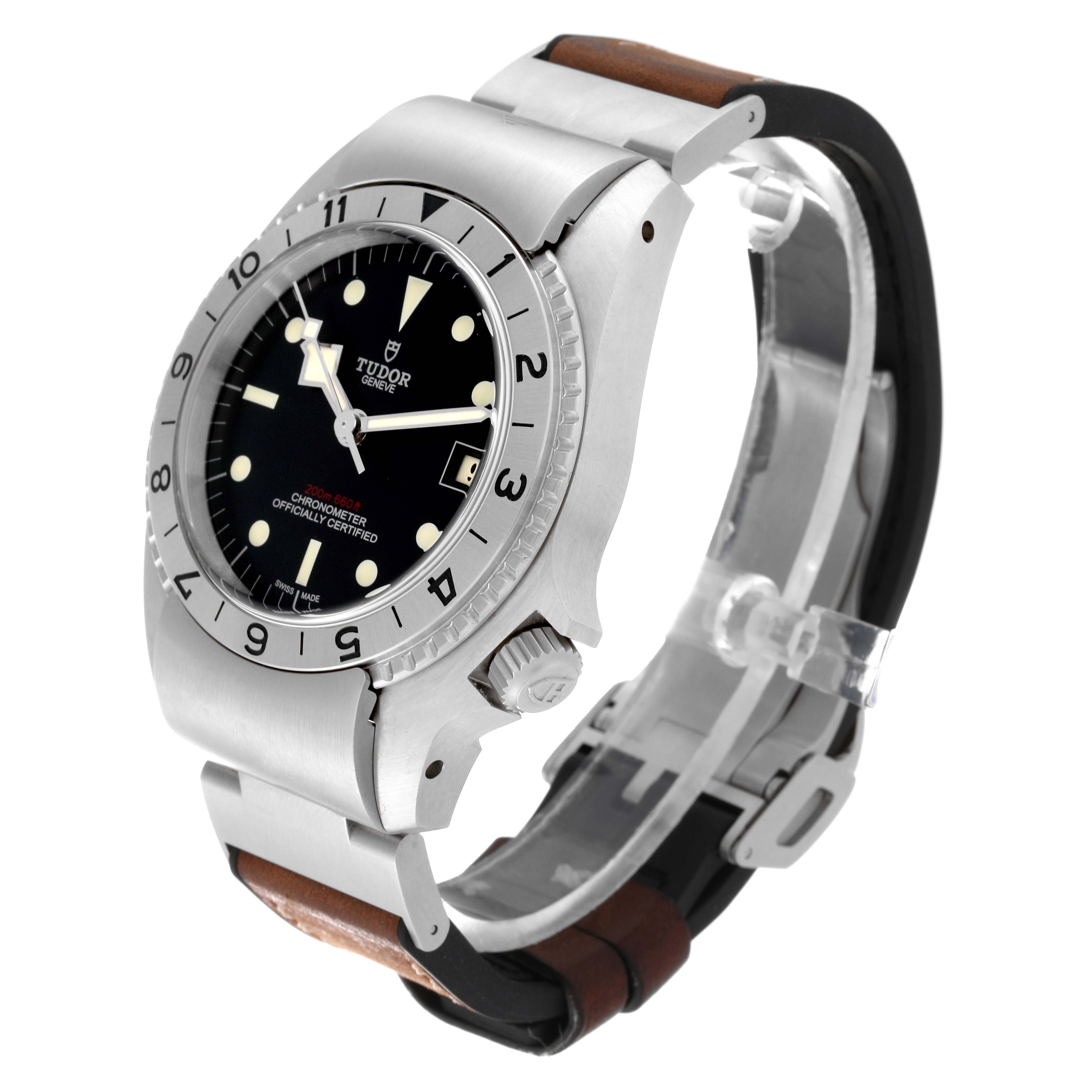 The image shows a side angle of the Tudor Heritage Black Bay 70150 Men's Stainless Steel Black Dial 70150 Men's Stainless Steel Black Dial watch, featuring its dial, bezel, crown, and partially visible strap.