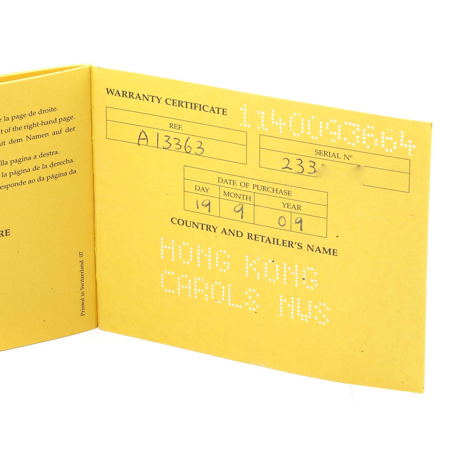 The image shows the warranty certificate for a Bentley model by Breitling, including details like the serial number, date of purchase, and retailer.