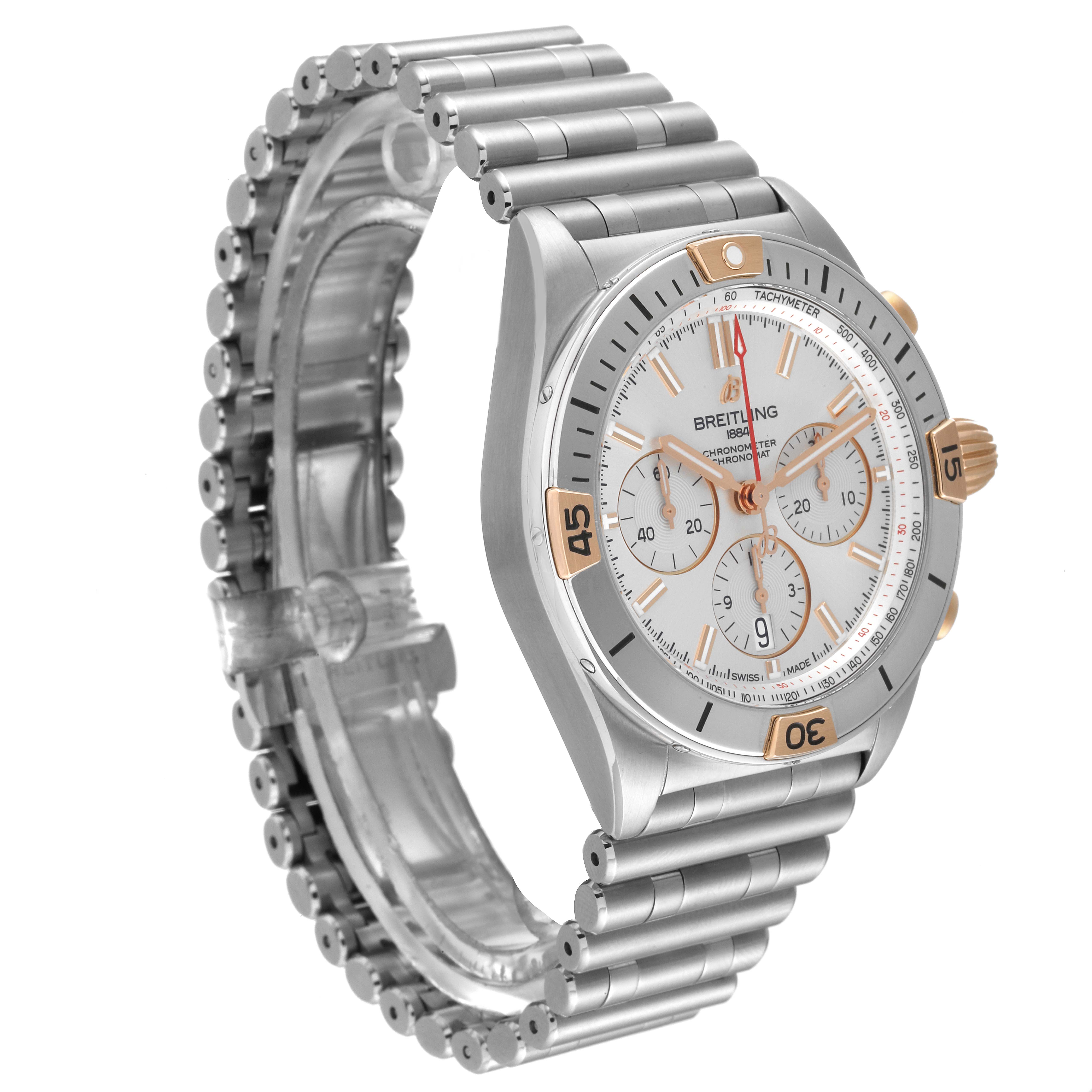 The image shows a side-on view of a Breitling Chronomat IB0134 Men's Steel and Gold (two tone) Silver Dial IB0134 Men's Steel and Gold (two tone) Silver Dial watch, displaying the watch face, bezel, crown, and part of the bracelet.