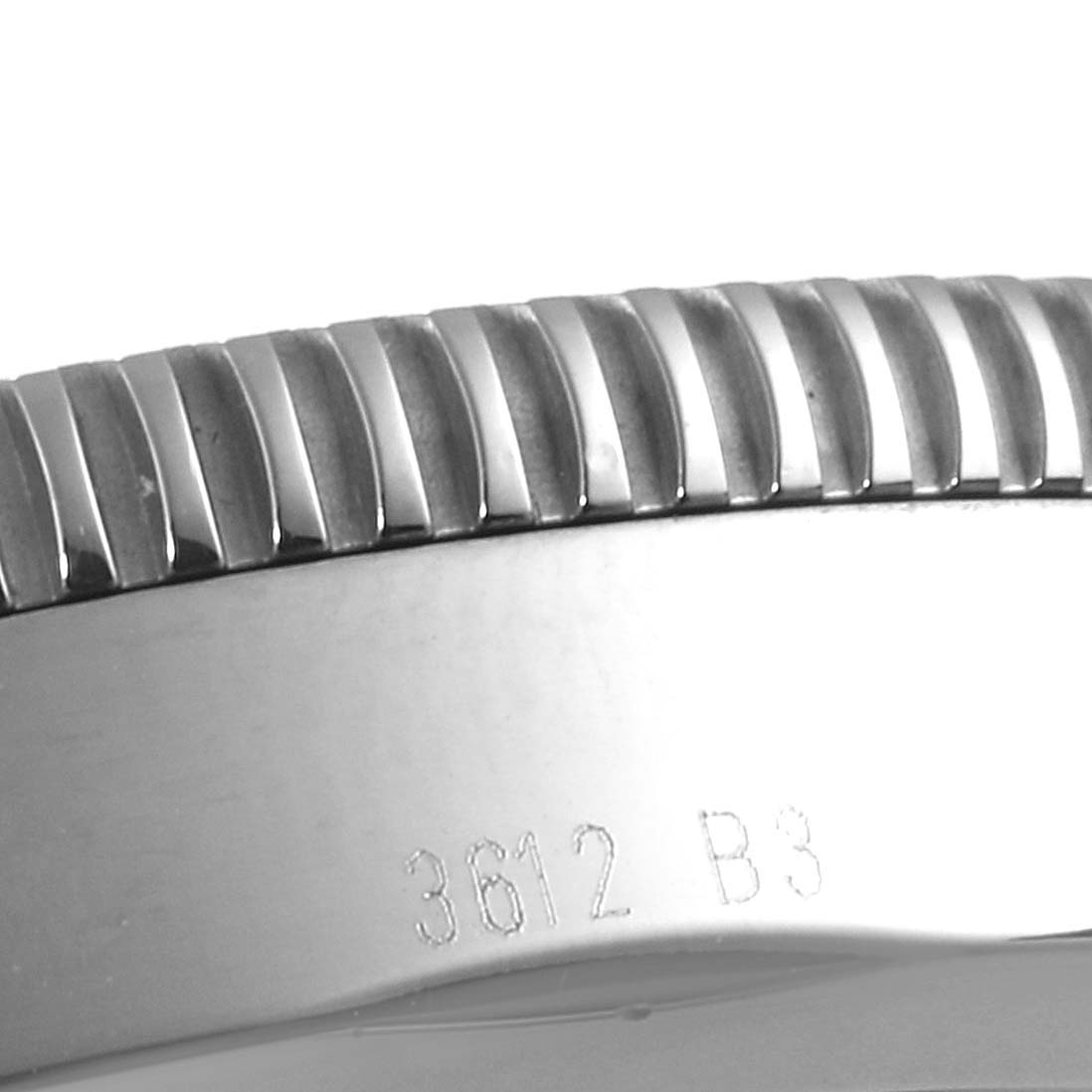 The image shows a close-up of the bezel and engraved serial number on a Breitling Superocean A17320 Men's Stainless Steel Black Dial A17320 Men's Stainless Steel Black Dial watch.