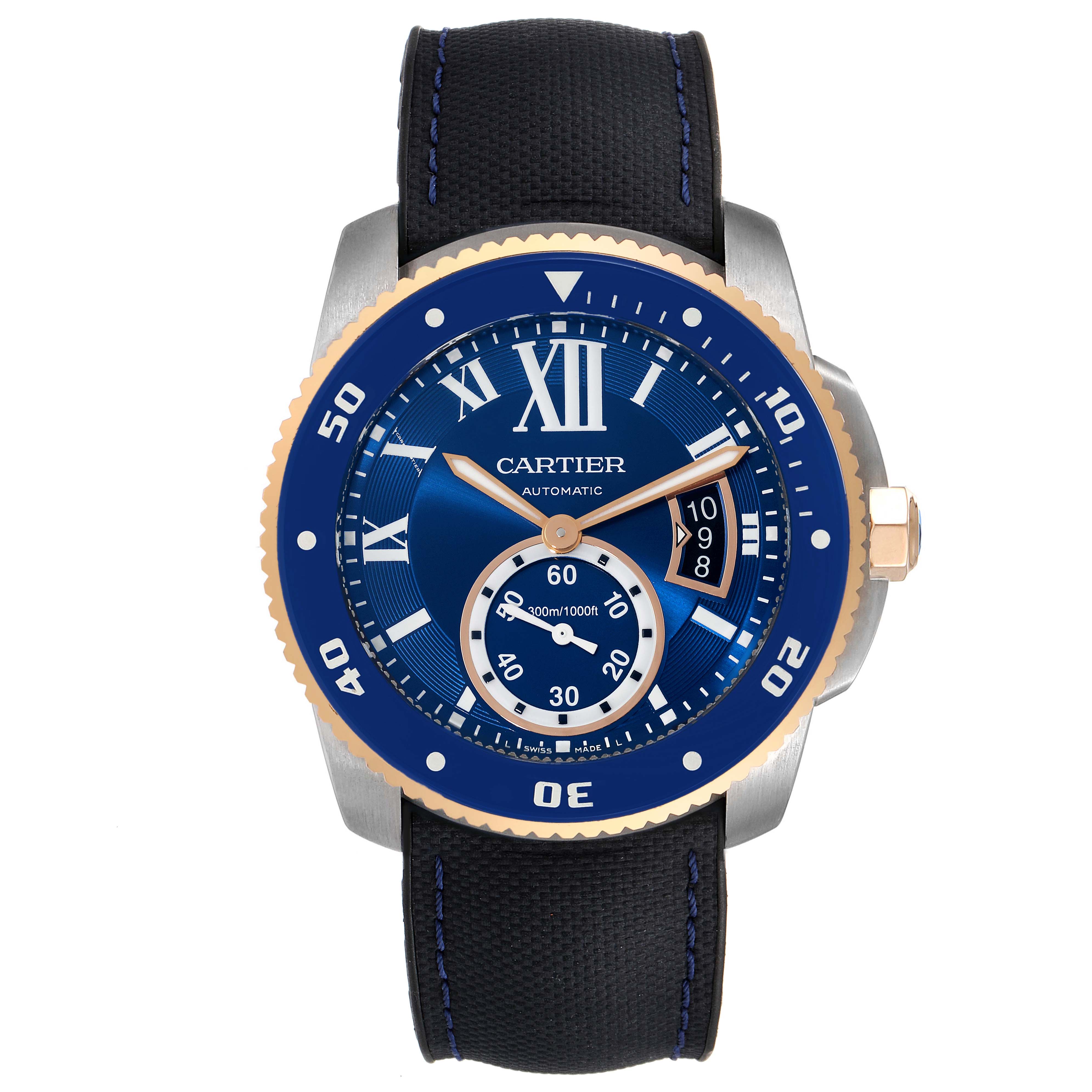 The image shows a frontal view of a Calibre de Cartier watch by Cartier, highlighting the blue dial, bezel, and strap.