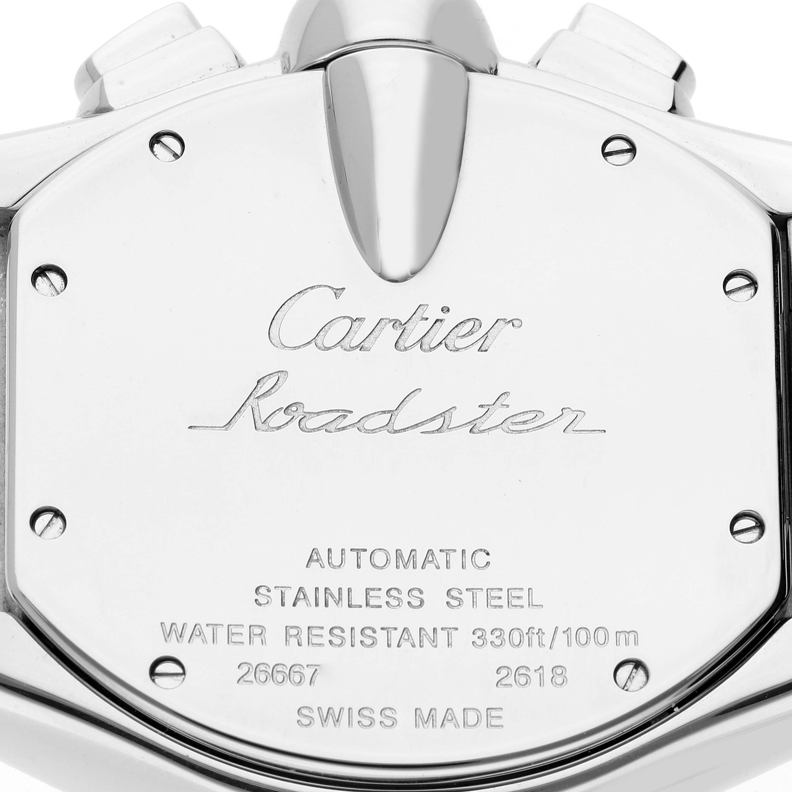 The image shows the back case of a Cartier Roadster W62020X6 Men's Stainless Steel Black Dial W62020X6 Men's Stainless Steel Black Dial watch with engravings and some visible screws.