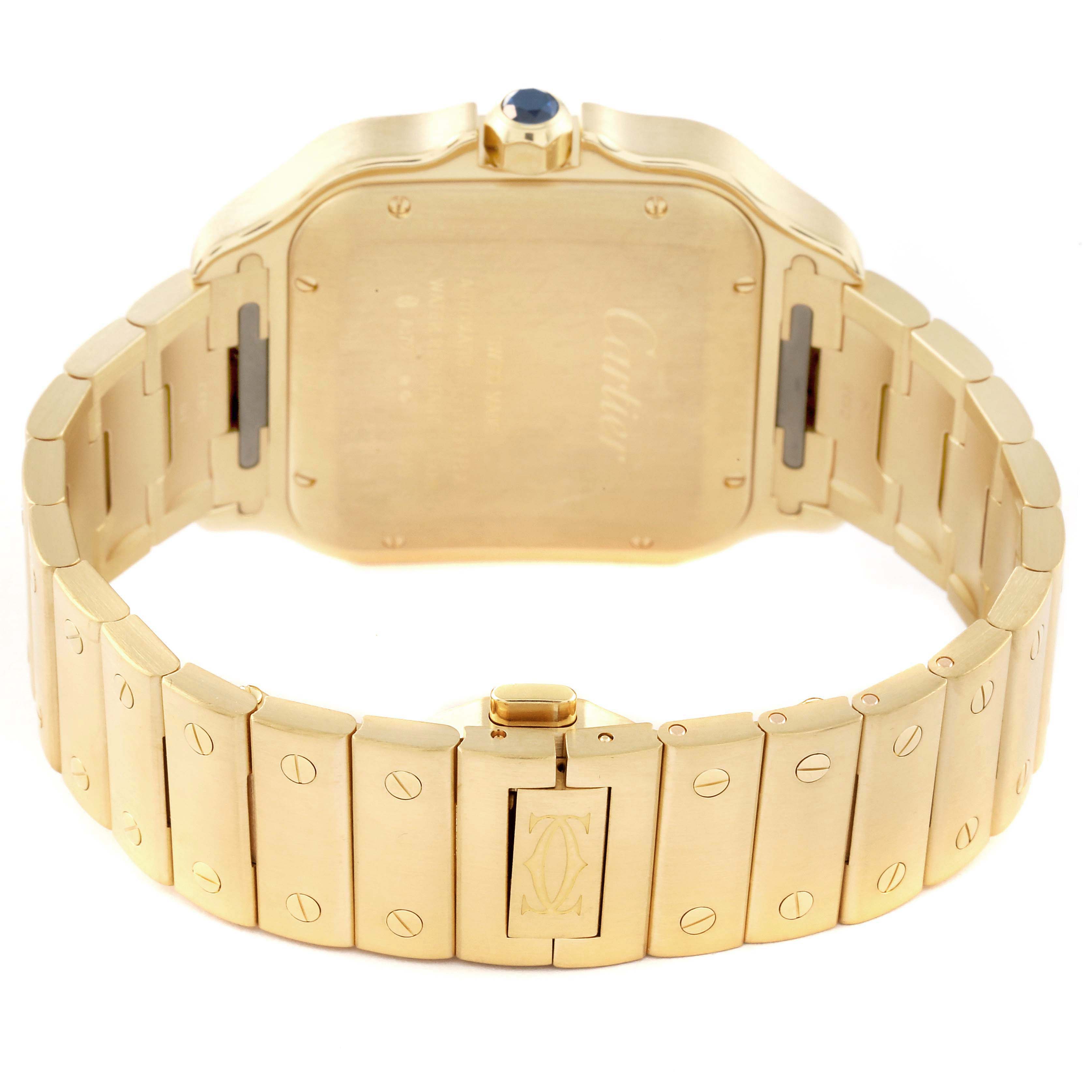 The image shows the rear view of a Cartier Santos WGSA029 Men's Yellow Gold Silver Dial WGSA029 Men's Yellow Gold Silver Dial watch, highlighting its gold bracelet and back case.