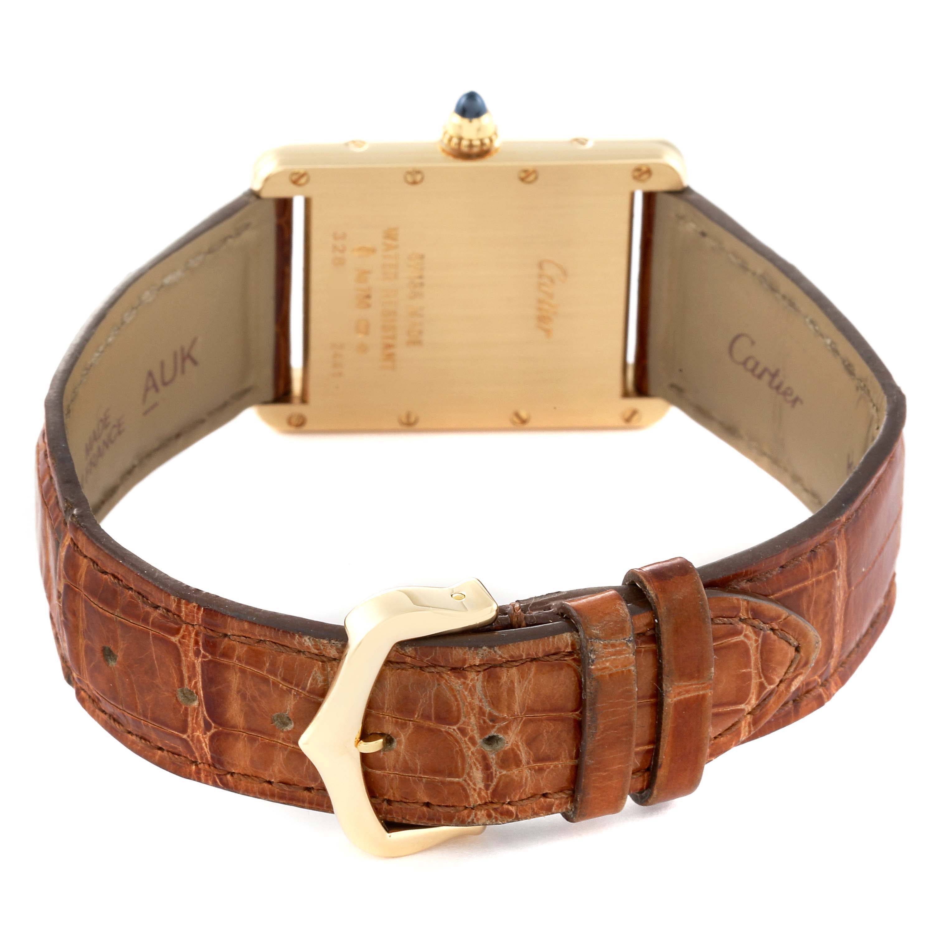 The image shows the back of a Cartier Tank Louis W1529756 Men's Yellow Gold Silver Dial W1529756 Men's Yellow Gold Silver Dial watch, highlighting its caseback, leather strap, and buckle clasp.