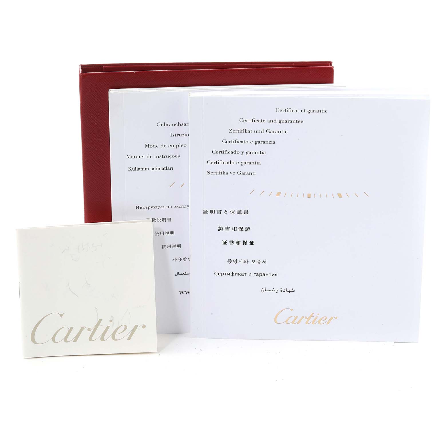 The image shows instruction manuals and warranty booklets for the Cartier Tank Louis W1529756 Men's Yellow Gold Silver Dial W1529756 Men's Yellow Gold Silver Dial model watch.