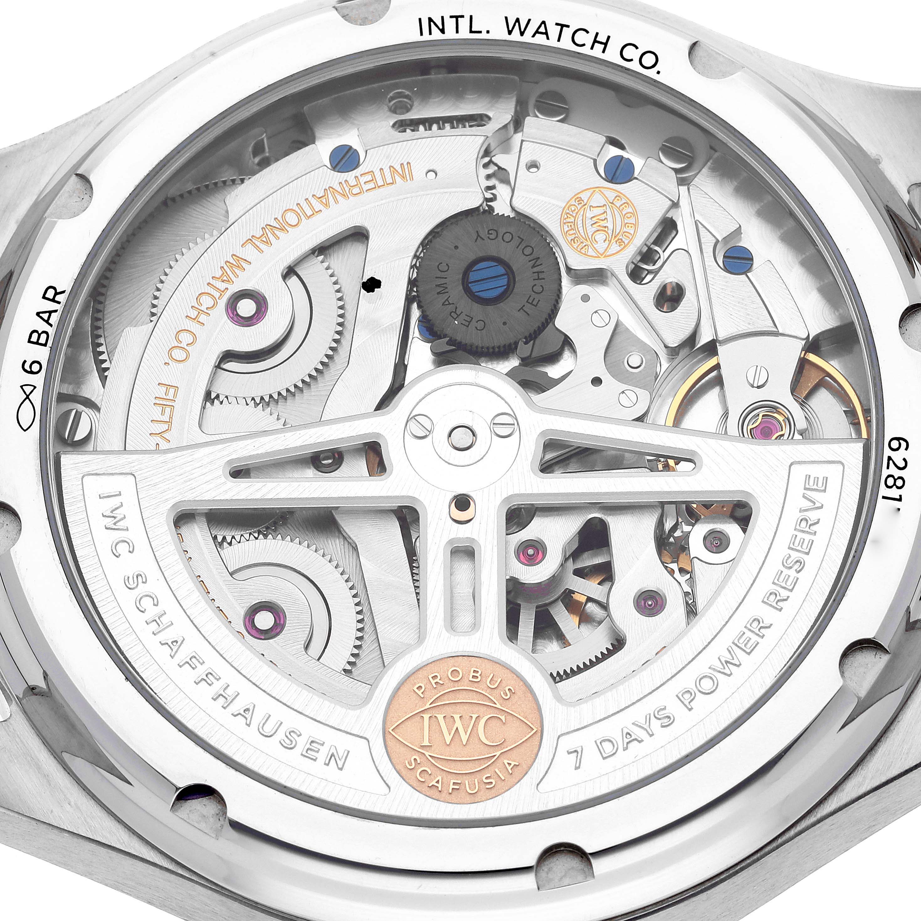 The image shows the back view of an IWC Pilot IW503605 Men's Stainless Steel Blue Dial IW503605 Men's Stainless Steel Blue Dial model, revealing its intricate mechanical movement and components.