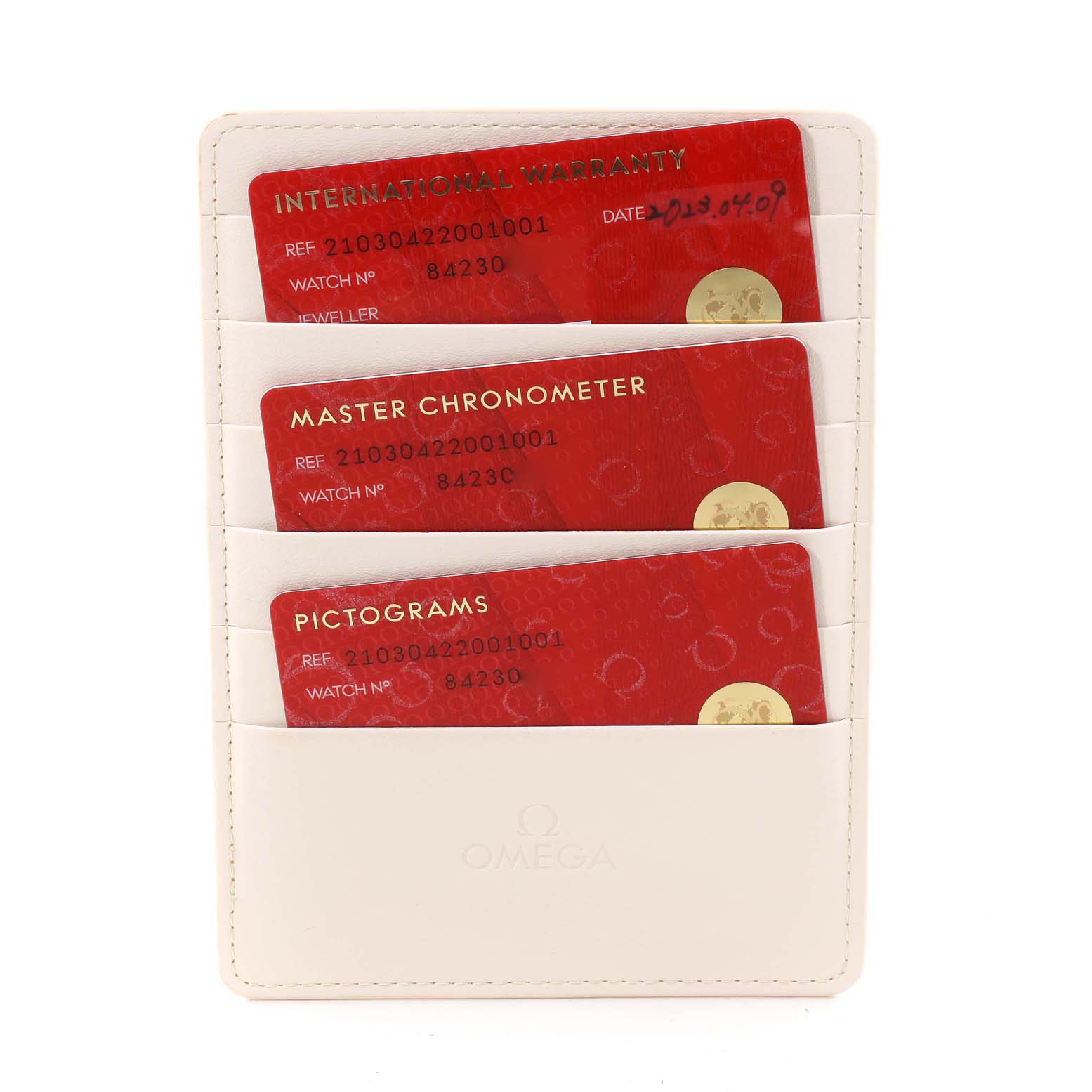 The image shows a white cardholder containing three red International Warranty, Master Chronometer, and Pictograms cards for the Omega Seamaster 210.30.42.20.01.001 Men's Stainless Steel Black Dial 210.30.42.20.01.001 Men's Stainless Steel Black Dial.