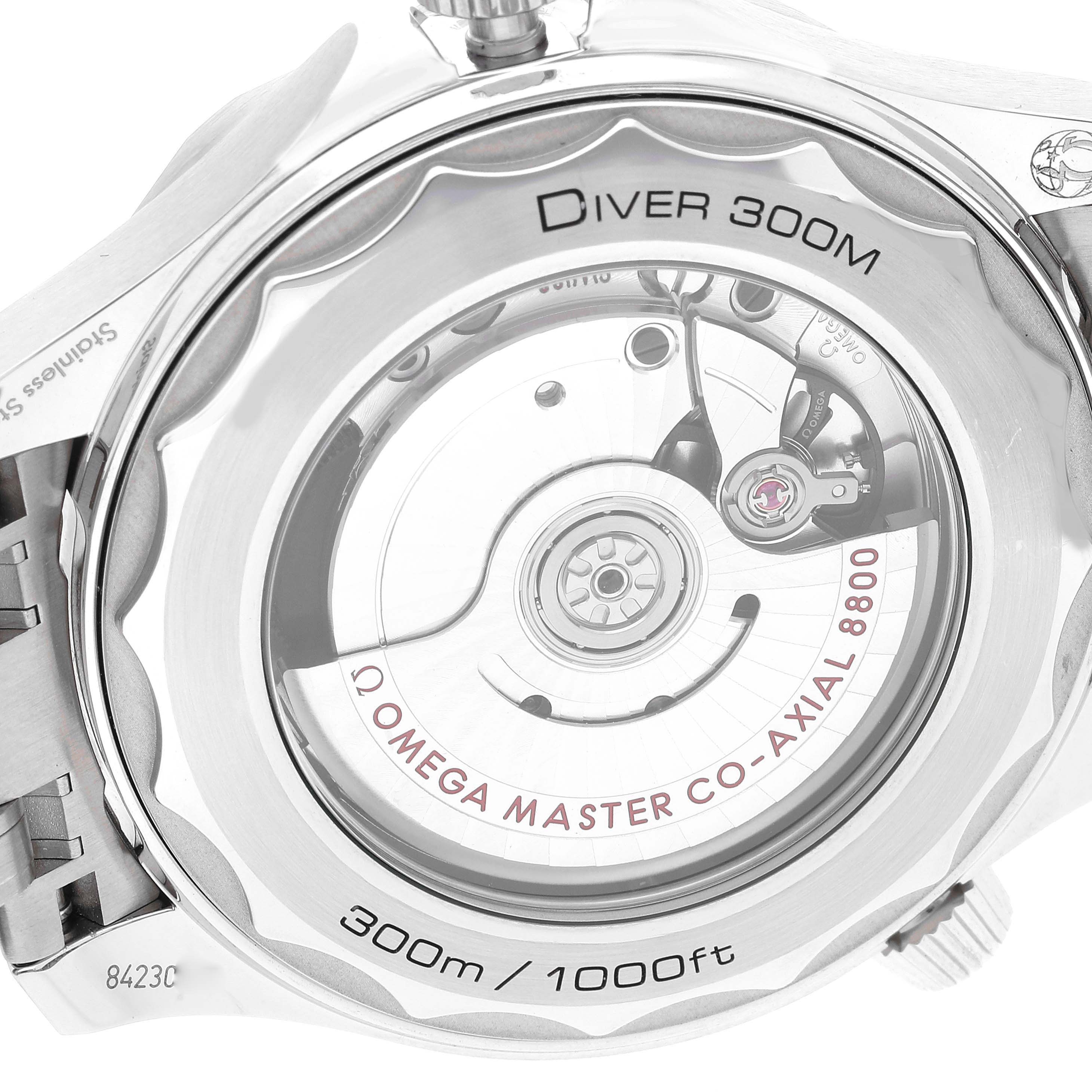 The image shows the back of the Omega Seamaster 210.30.42.20.01.001 Men's Stainless Steel Black Dial 210.30.42.20.01.001 Men's Stainless Steel Black Dial watch, highlighting its movement and "Diver 300M" marking.