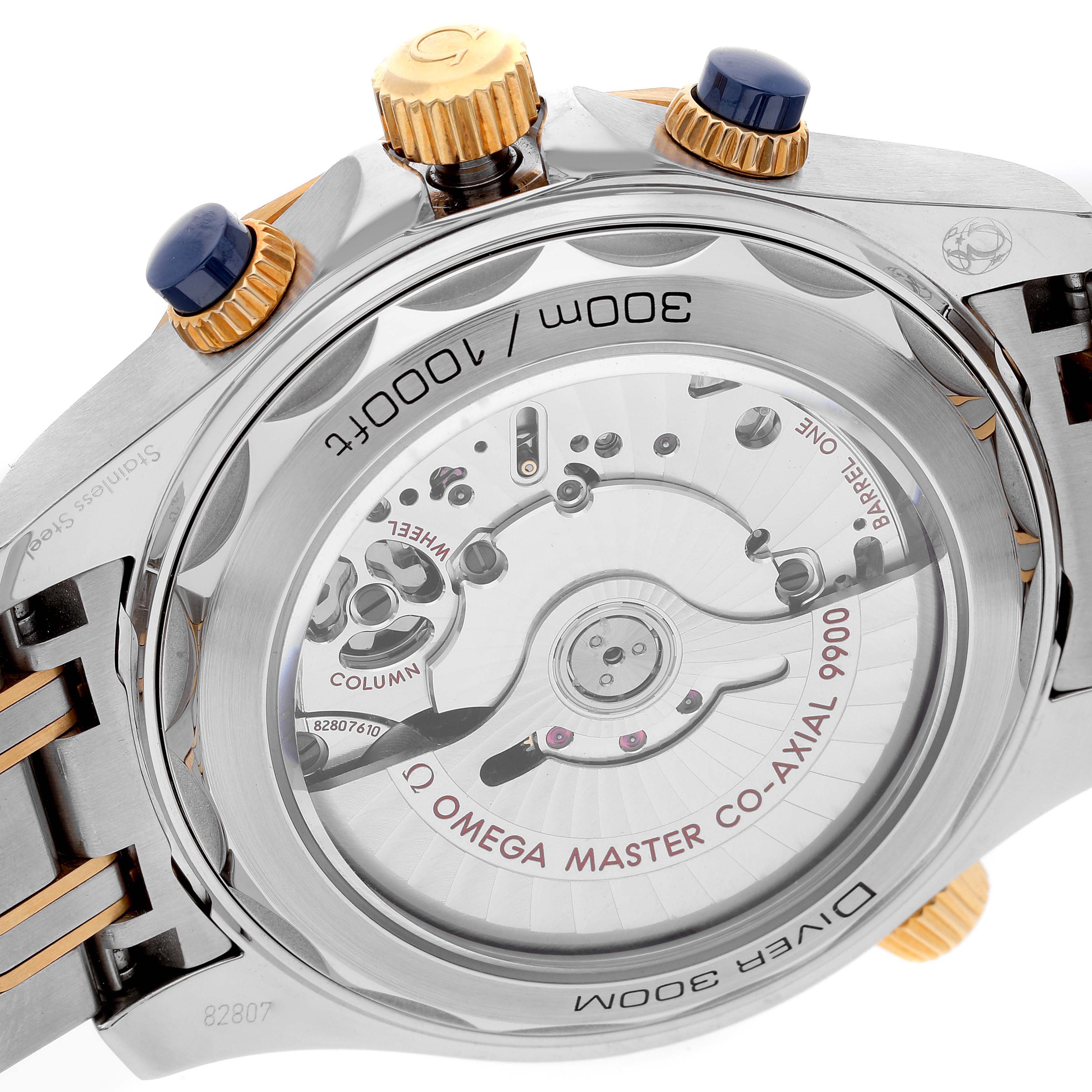 This image shows the back of the Omega Seamaster 210.20.44.51.03.001 Men's Steel and Gold (two tone) Blue Dial 210.20.44.51.03.001 Men's Steel and Gold (two tone) Blue Dial watch, highlighting its movement and crown.