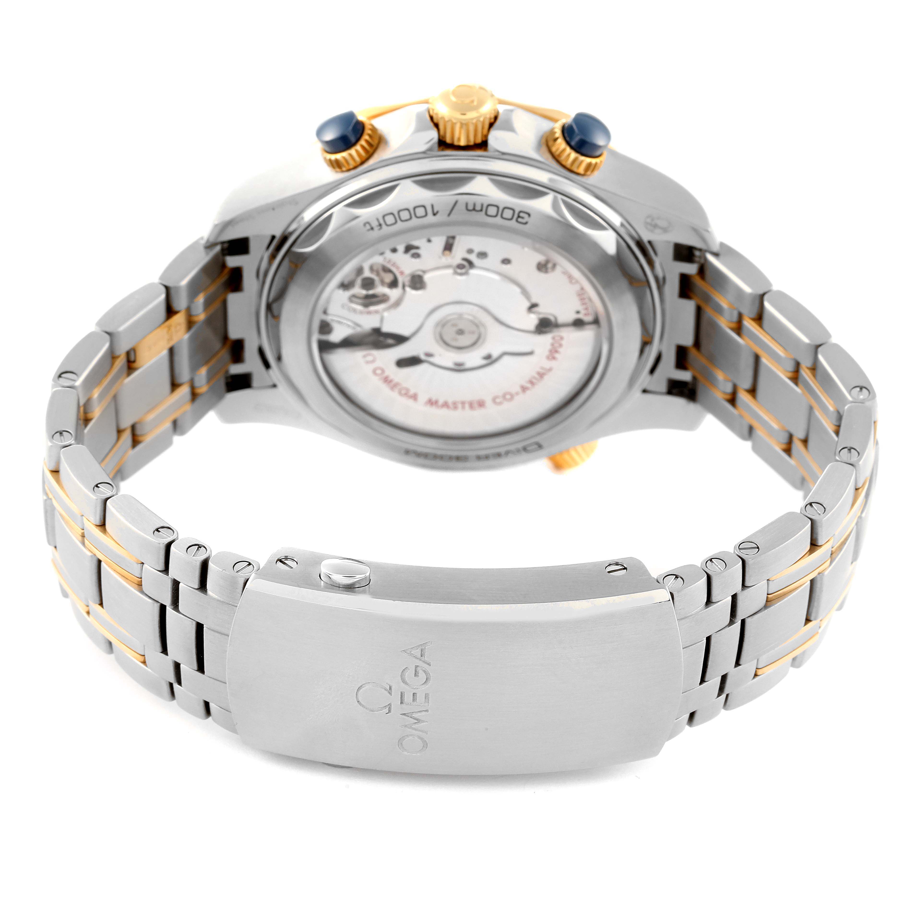 The image shows the back and bracelet of the Omega Seamaster 210.20.44.51.03.001 Men's Steel and Gold (two tone) Blue Dial 210.20.44.51.03.001 Men's Steel and Gold (two tone) Blue Dial, highlighting its movement mechanism and stainless steel clasp.