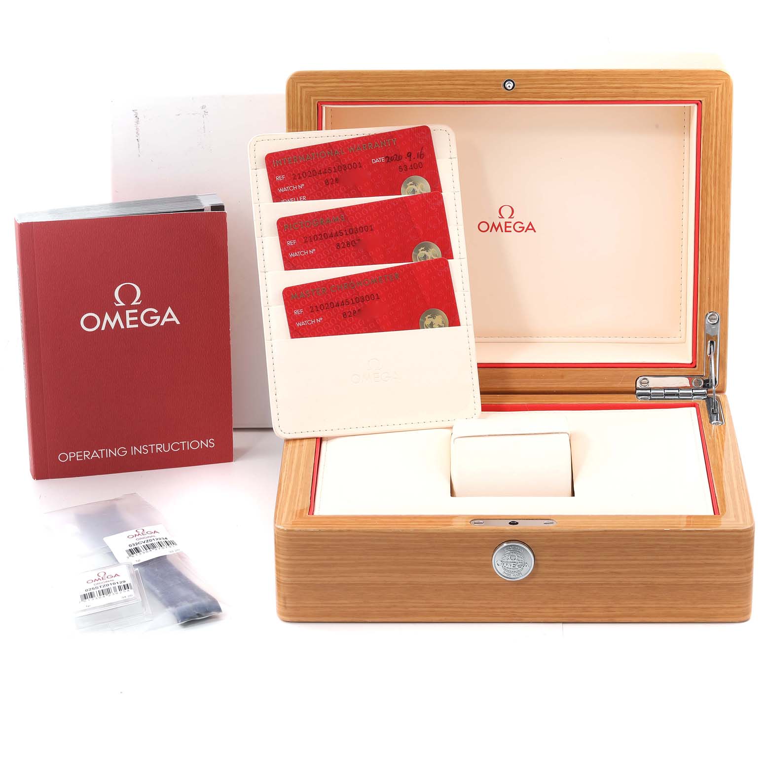 The image shows an Omega Seamaster 210.20.44.51.03.001 Men's Steel and Gold (two tone) Blue Dial 210.20.44.51.03.001 Men's Steel and Gold (two tone) Blue Dial watch box, operating instructions, warranty cards, and additional accessories at an angle.