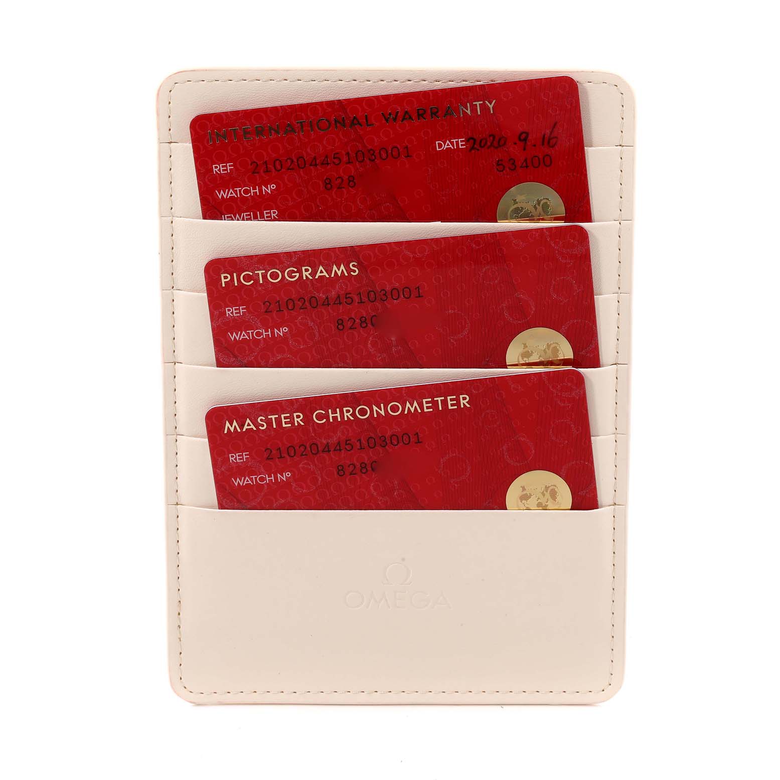 The image shows warranty and certification cards for the Omega Seamaster 210.20.44.51.03.001 Men's Steel and Gold (two tone) Blue Dial 210.20.44.51.03.001 Men's Steel and Gold (two tone) Blue Dial, including International Warranty, Pictograms, and Master Chronometer cards.