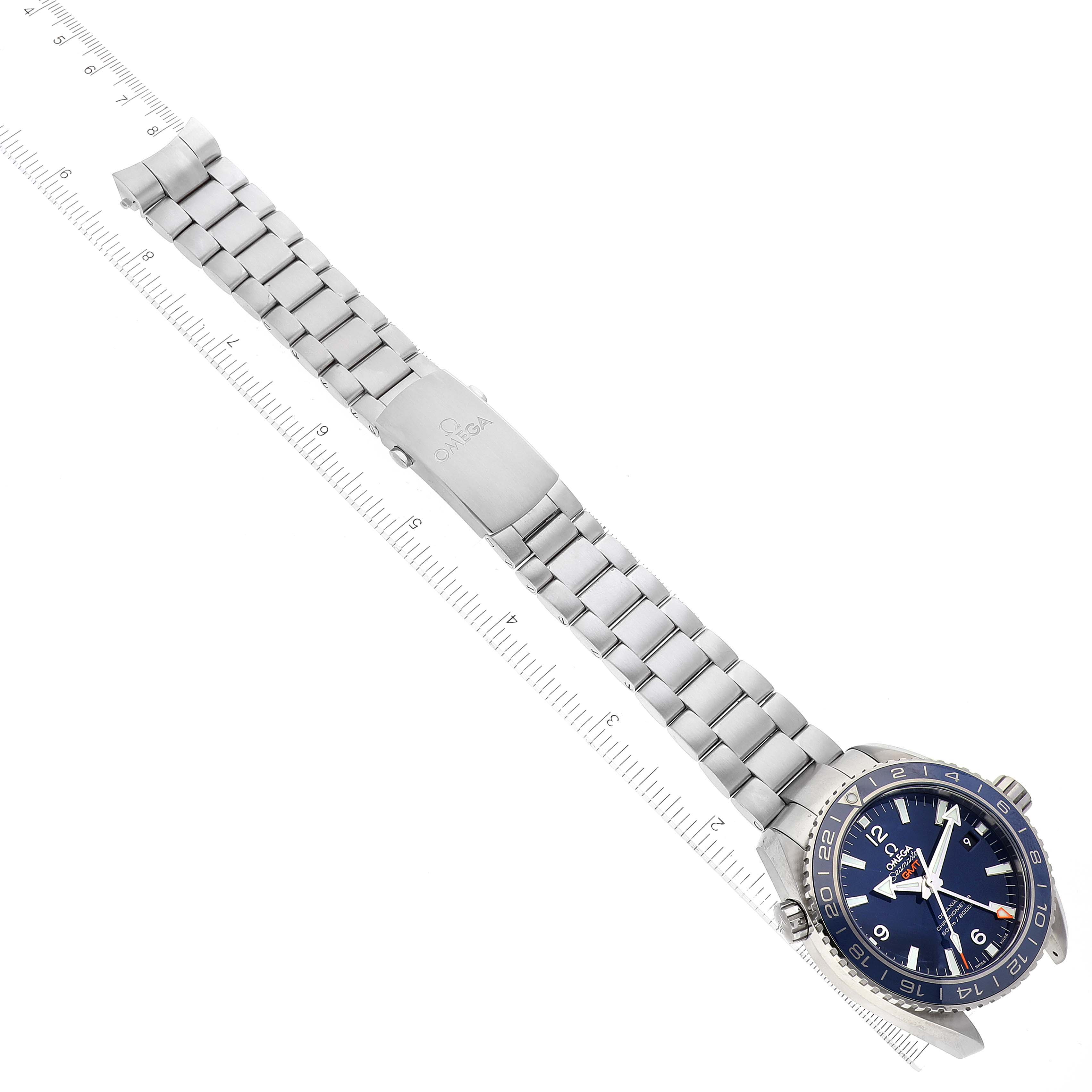 The Omega Planet Ocean 232.92.44.22.03.001 Men's Stainless Steel Blue Dial 232.92.44.22.03.001 Men's Stainless Steel Blue Dial watch is shown from a top-down angle, displaying the full face, bezel, and metal bracelet.