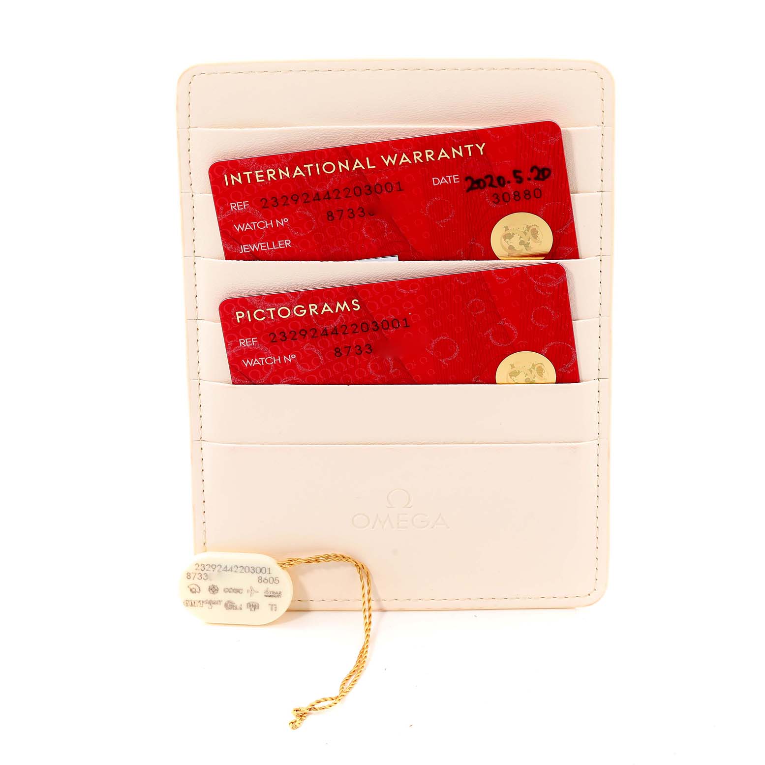 The image shows warranty cards and a tag for the Omega Planet Ocean 232.92.44.22.03.001 Men's Stainless Steel Blue Dial 232.92.44.22.03.001 Men's Stainless Steel Blue Dial watch, along with a card holder.