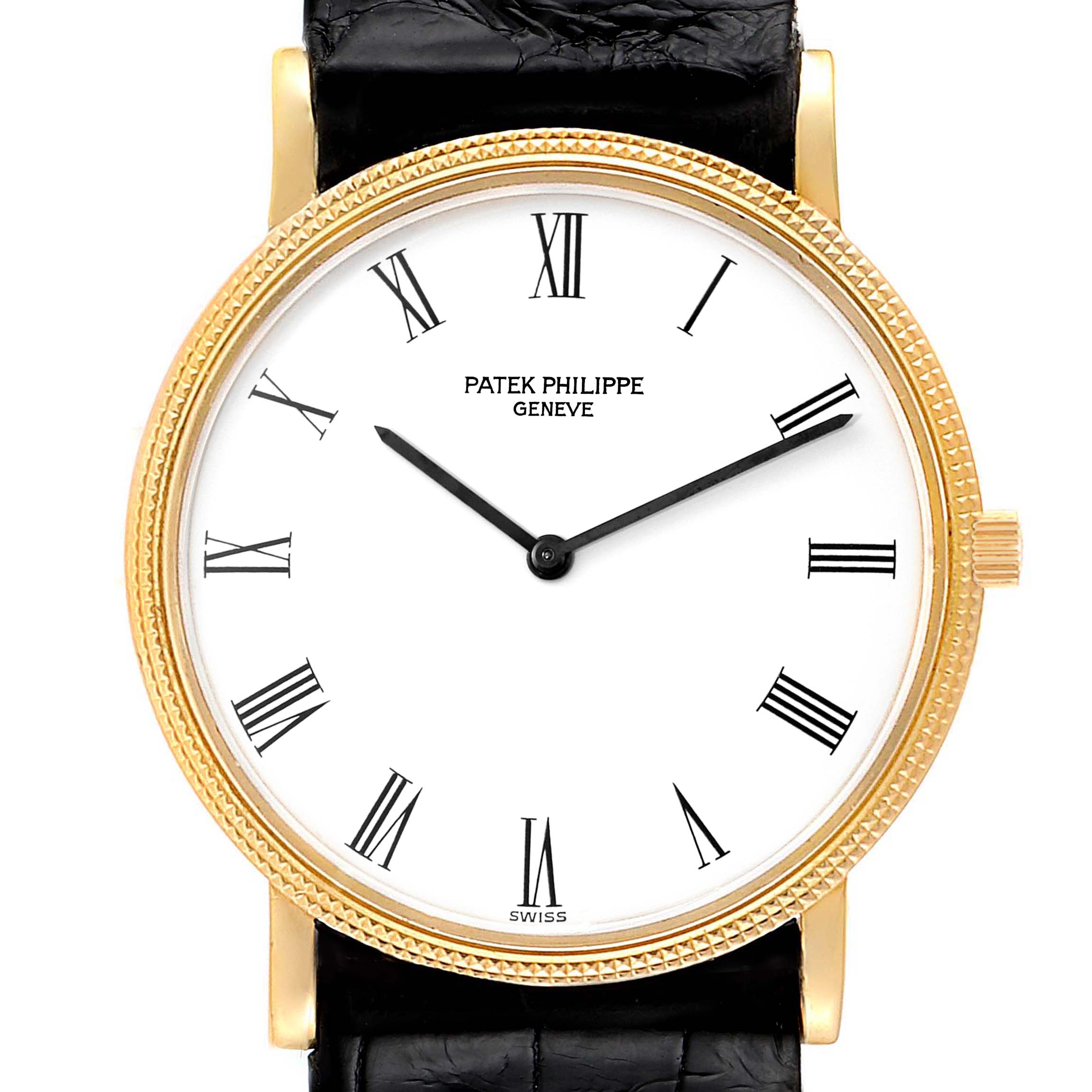 The image shows a front view of a Patek Philippe Calatrava 3520 Men's Yellow Gold White Dial 3520 Men's Yellow Gold White Dial watch, highlighting its dial, hands, case, and leather strap.