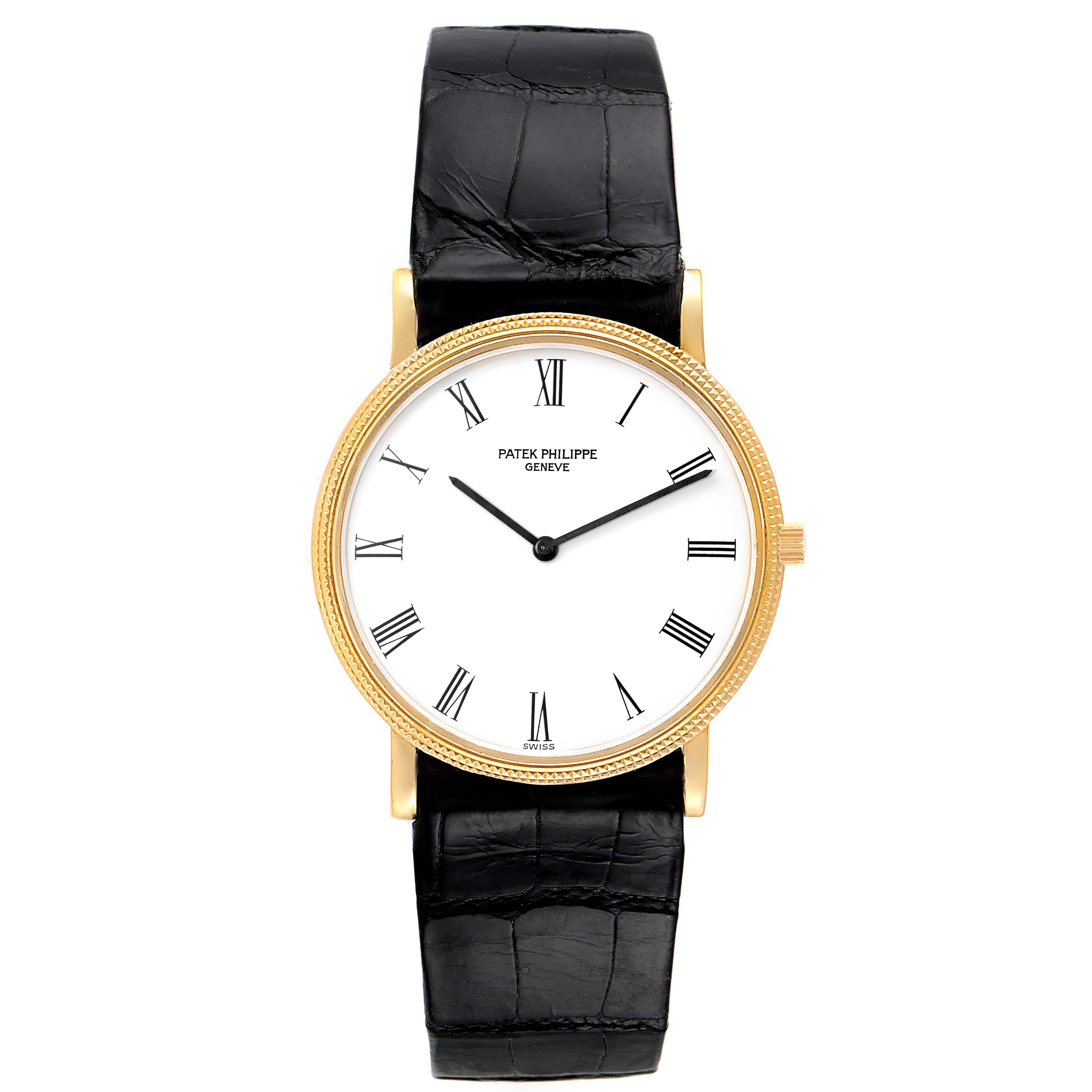 The image shows a front view of the Patek Philippe Calatrava 3520 Men's Yellow Gold White Dial 3520 Men's Yellow Gold White Dial watch with a gold case and black leather strap.