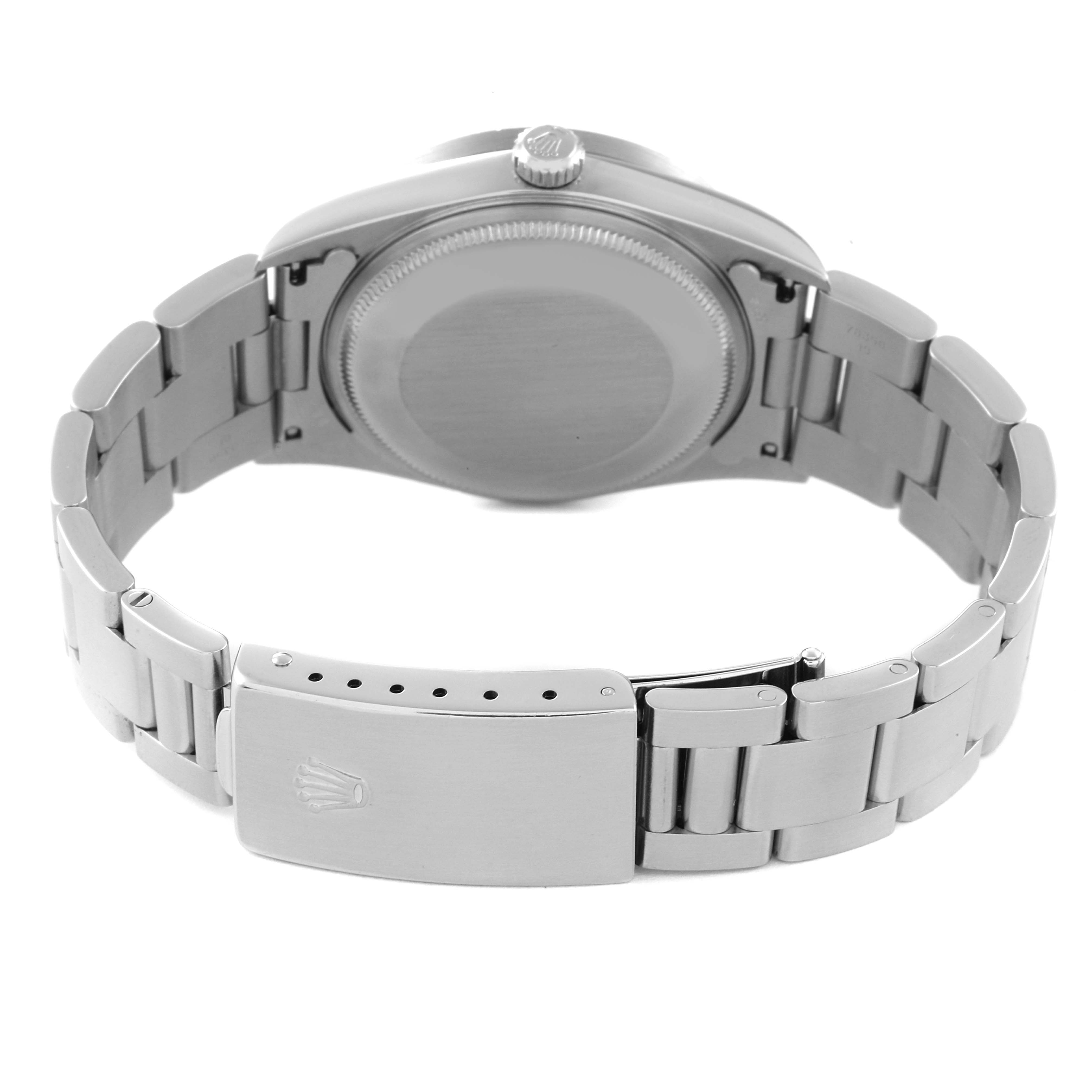 The image shows the back view of the Rolex Air-King 14010 Men's Stainless Steel Black Dial 14010 Men's Stainless Steel Black Dial watch, focusing on its clasp, bracelet, and case back.