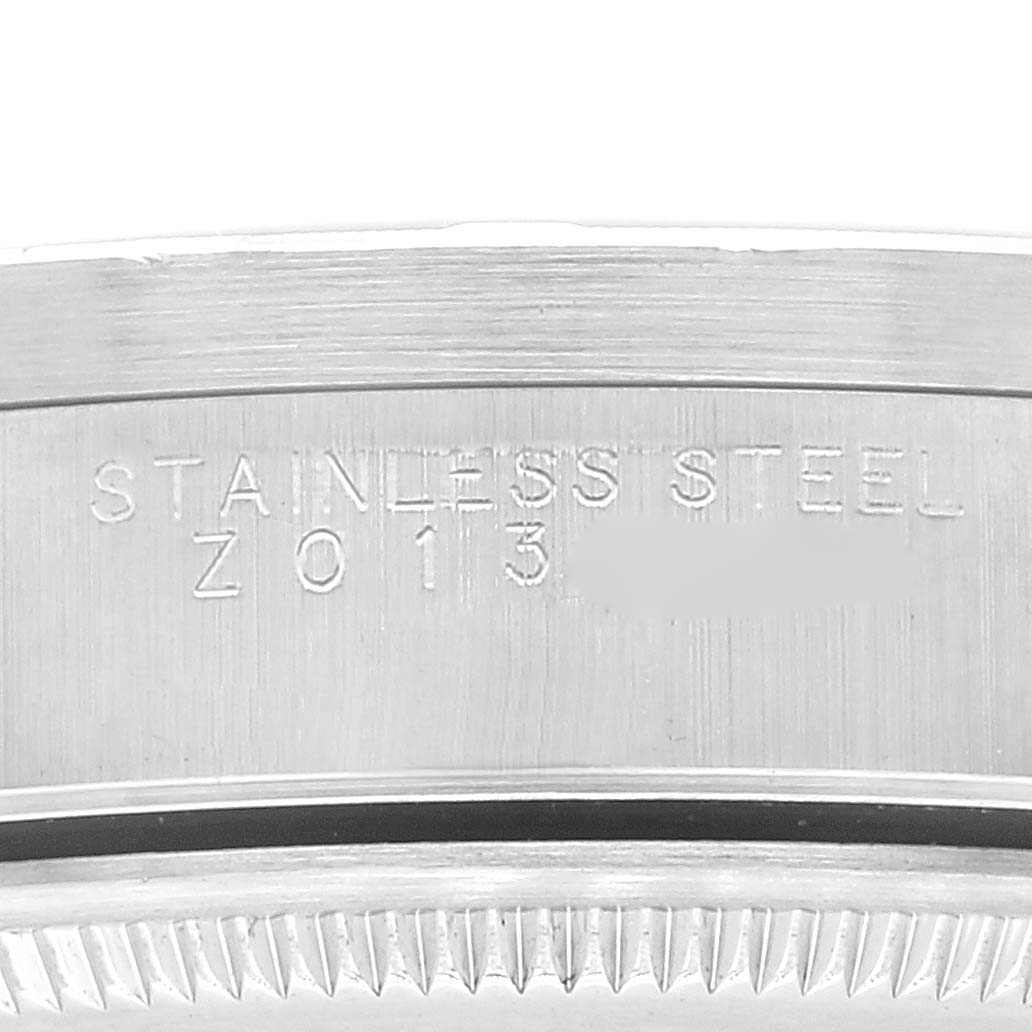 This close-up angle shows the case back edge with "Stainless Steel" engraved on the Rolex Air-King 14010 Men's Stainless Steel Black Dial 14010 Men's Stainless Steel Black Dial model.