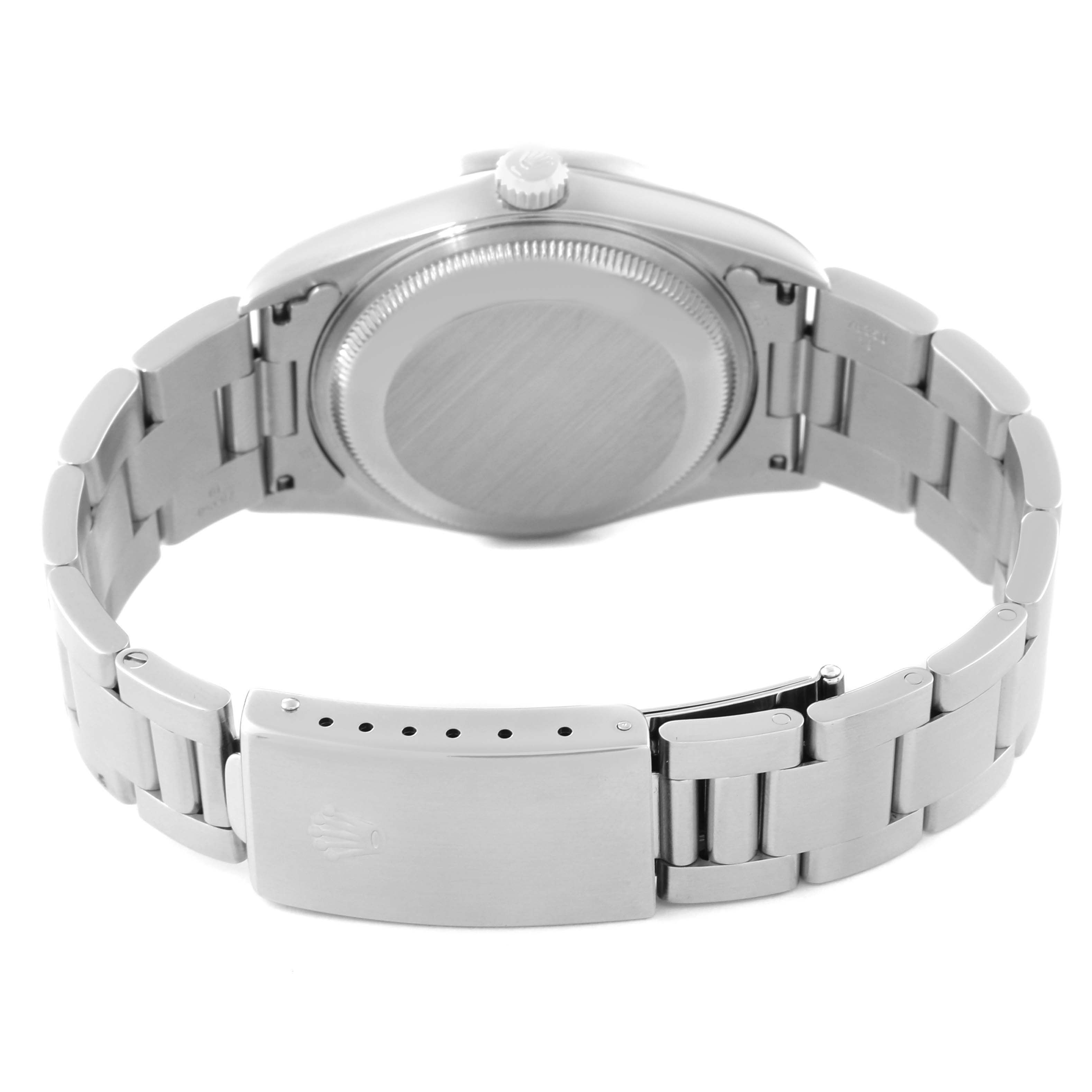 This image shows the back view of a Rolex Date 15210 Men
s Stainless Steel Black Dial 15210 Men
s Stainless Steel Black Dial model watch, highlighting the case back and the clasp of the bracelet.