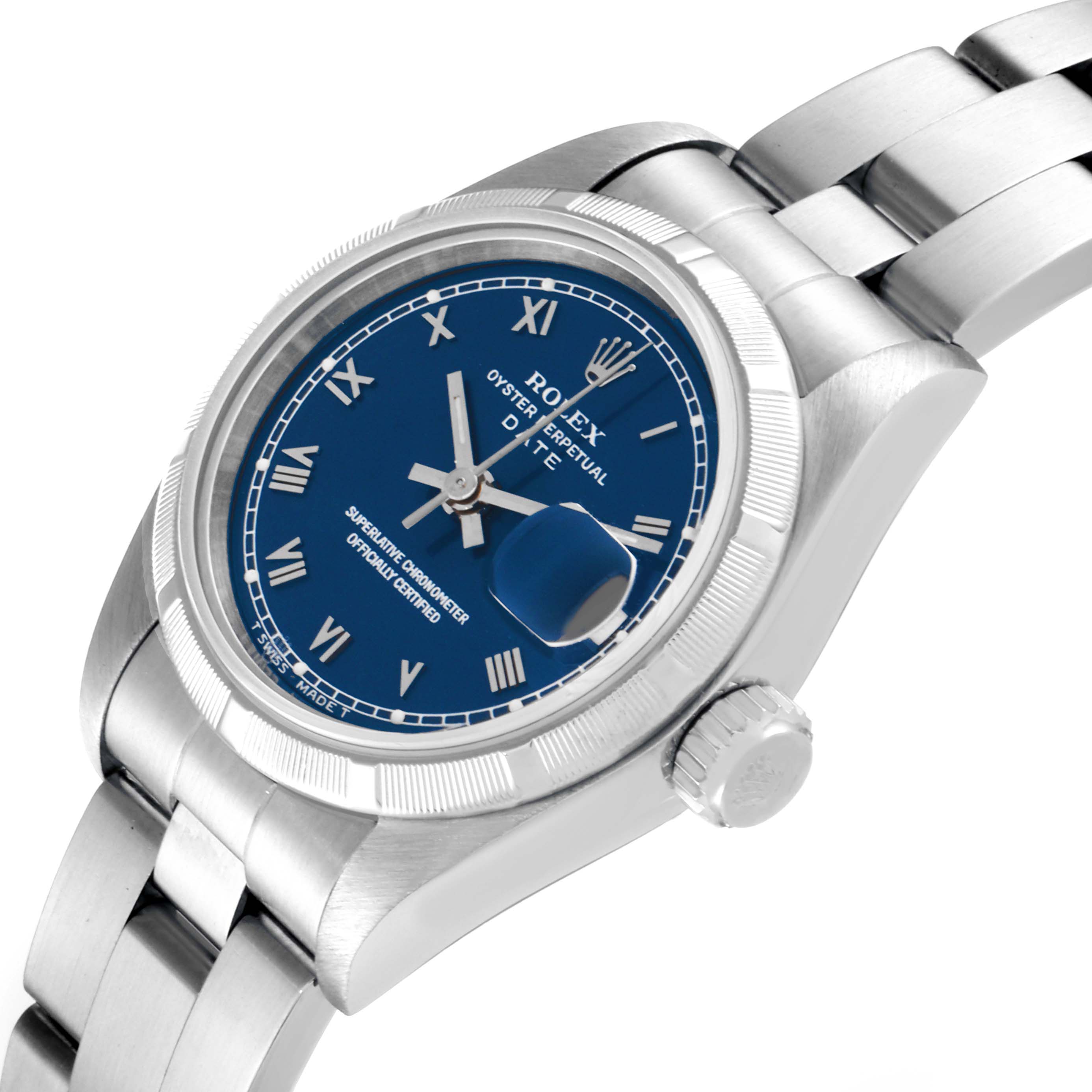 This is a close-up angle showing the face, bezel, crown, and part of the bracelet of the Rolex Date 69190 Women's Stainless Steel Blue Dial 69190 Women's Stainless Steel Blue Dial model watch.