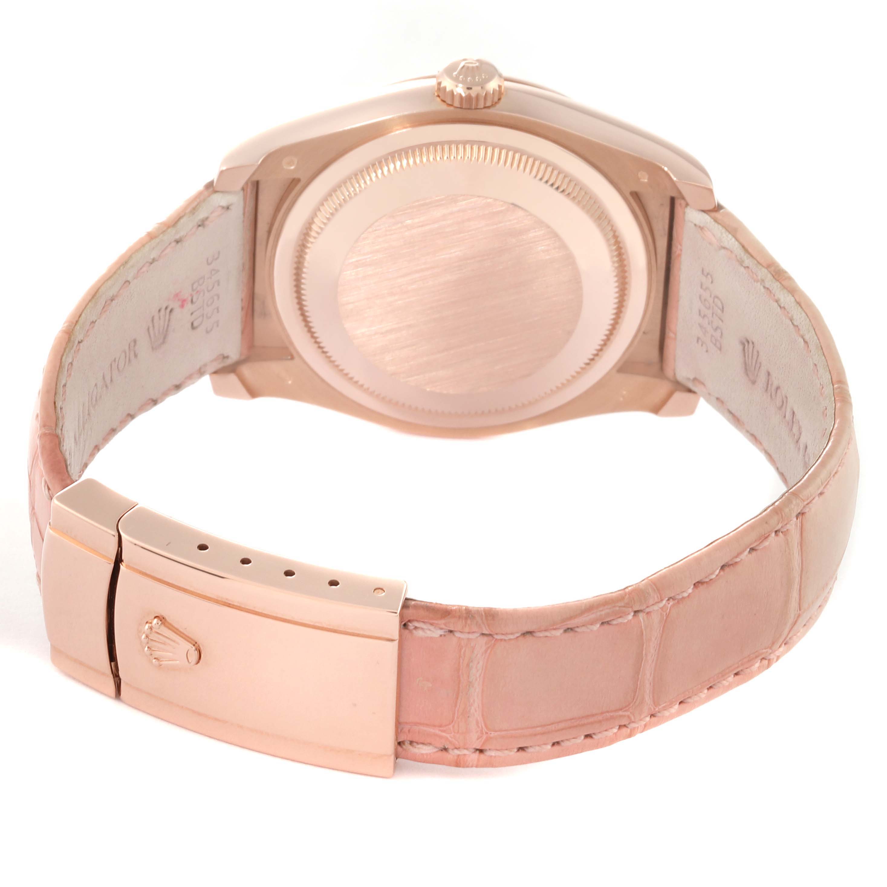 The image shows the back view of a Rolex President 116135 Men's Rose Gold Mother of Pearl Dial 116135 Men's Rose Gold Mother of Pearl Dial model watch, highlighting the case back, crown, and leather strap with clasp.